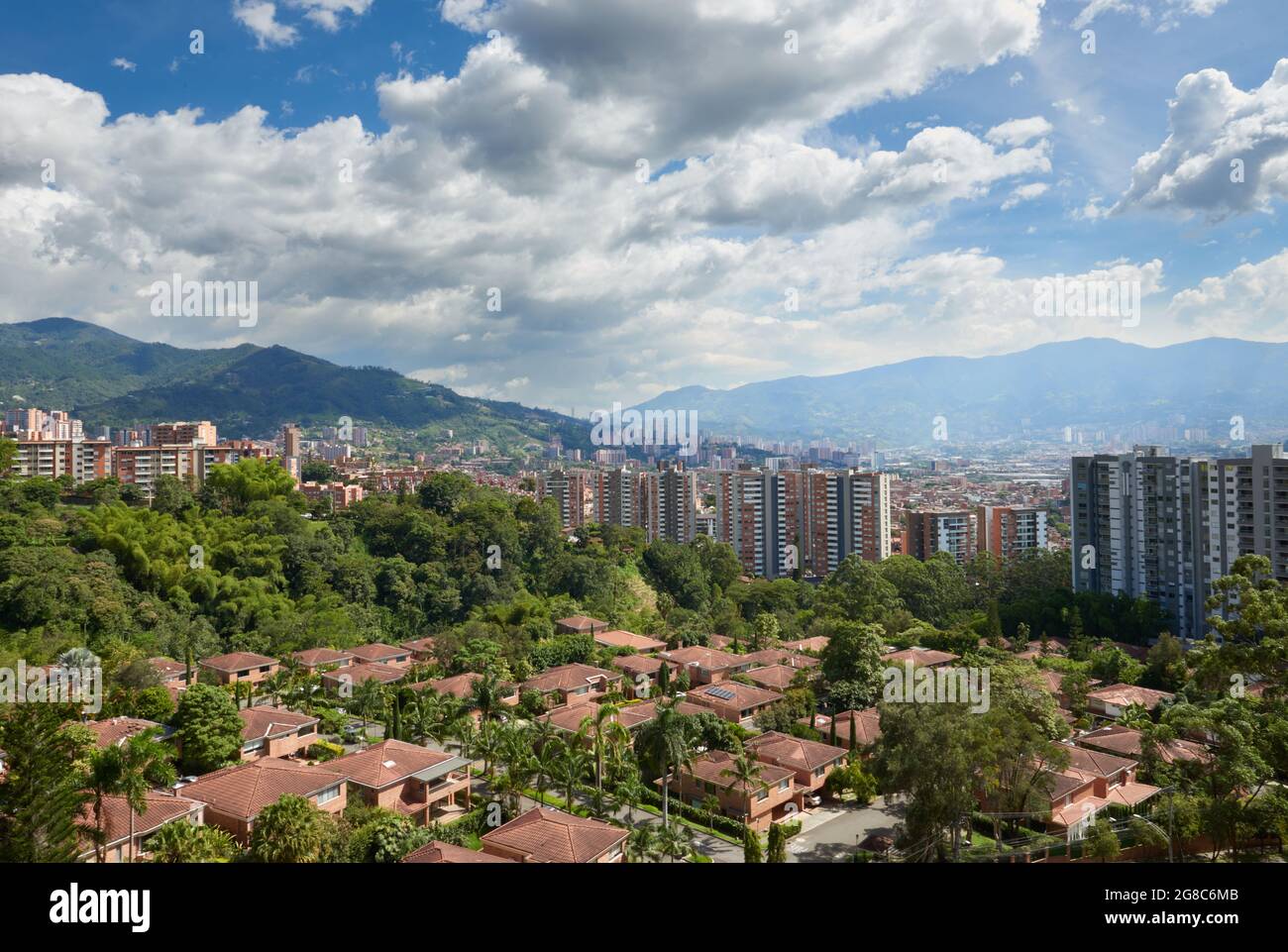 Beautiful shot of Medellin city surrounded by greenerycovered
