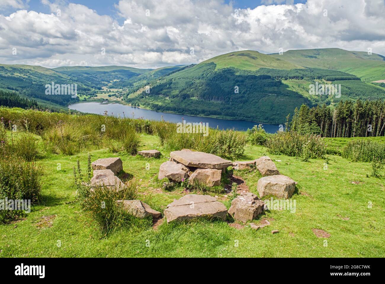 A Brecon Beacons landscape showing the Talybont Valley, Waun Rydd in the right distance and a stone table and chairs Stock Photo