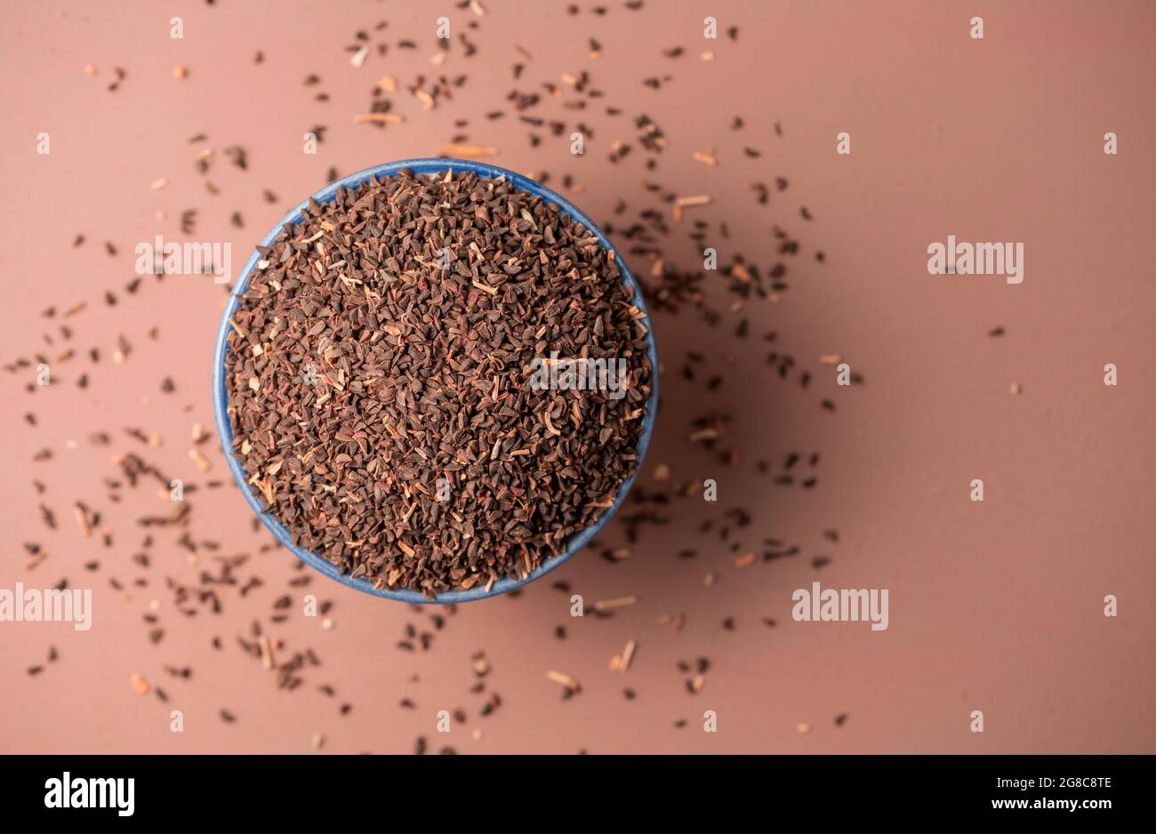 Top view of peganum harmala seeds in a bowl Stock Photo