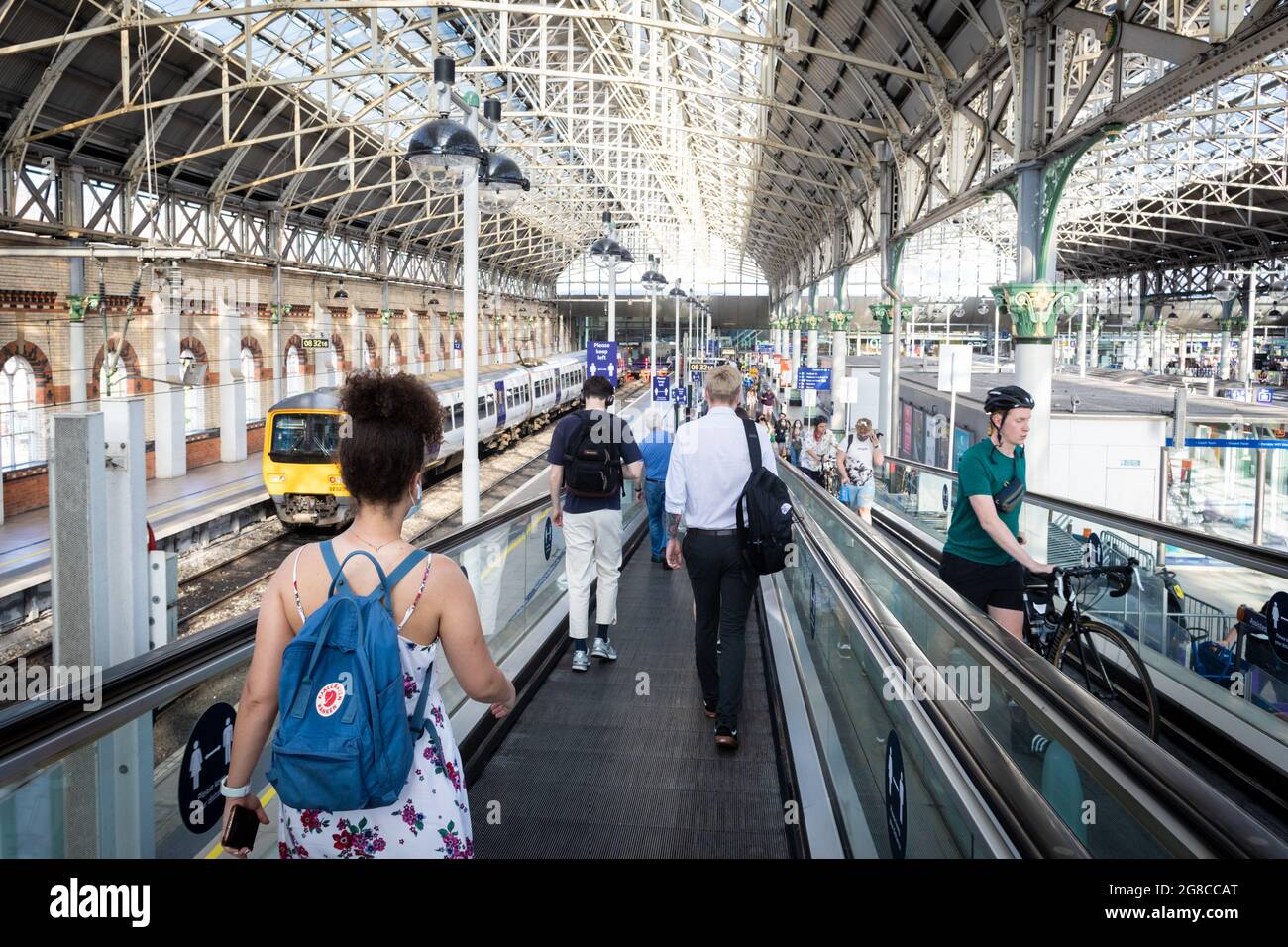 Manchester, UK. 19th July, 2021. Morning commuters make their way through Piccadilly train station to work on the first day of freedom since the COVID19 lockdown restrictions were implemented 16 months ago. Credit: Andy Barton/Alamy Live News Stock Photo