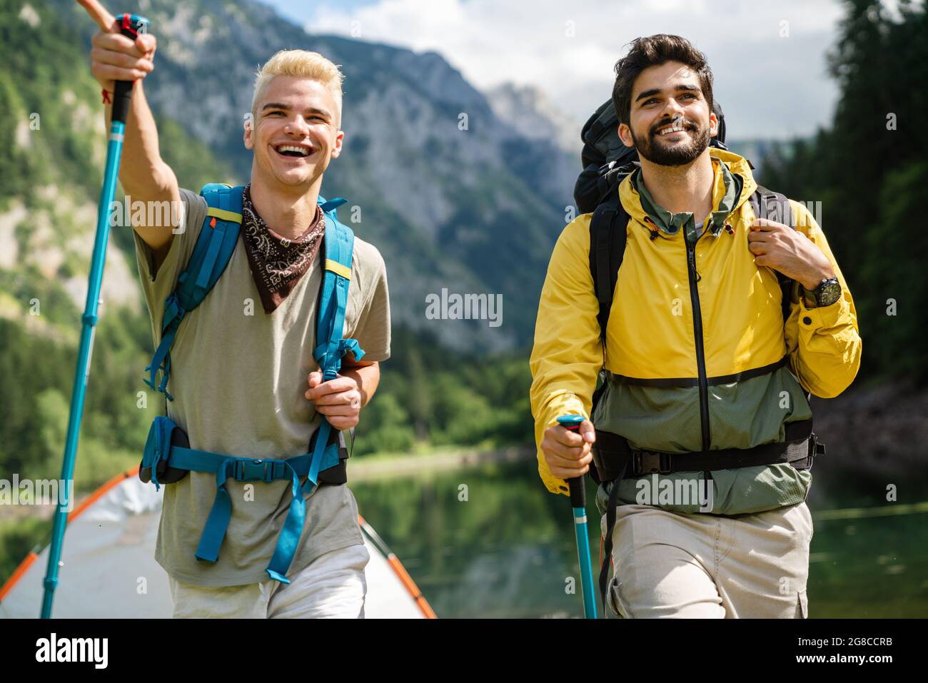 Group of friends on a hiking, camping trip in the mountains Stock Photo ...