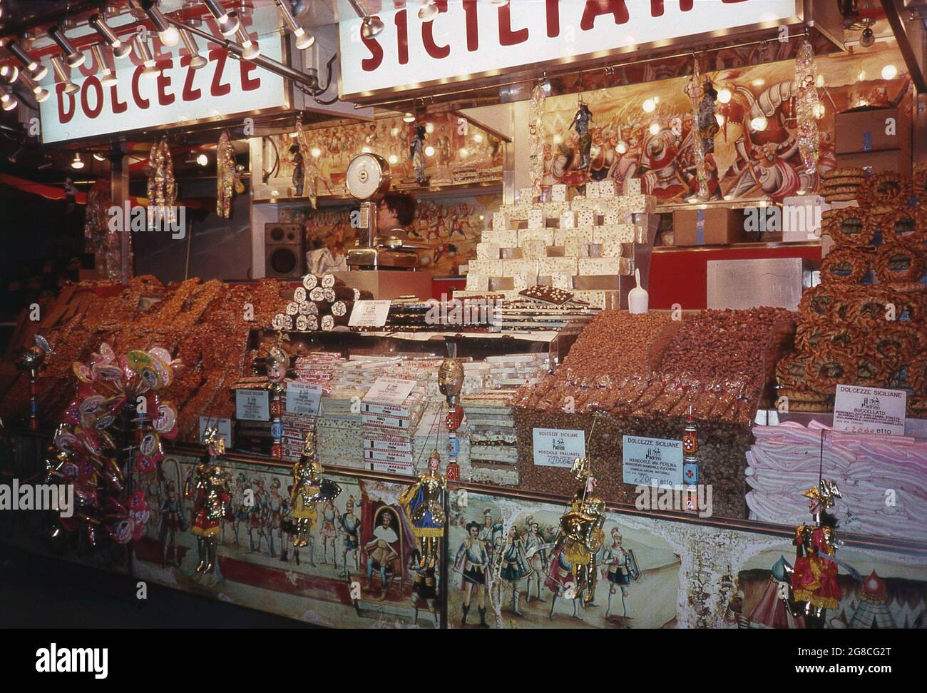 1960s, historical, Italy, Milan Bike Show, 'Dolcezze Siciliane'...exterior view of an Italian food stall selling a range of Siciliane pastries. The island of Sicily is famous for its sweet pastries with the cannolo being the king of the sicillan patisserie. Stock Photo