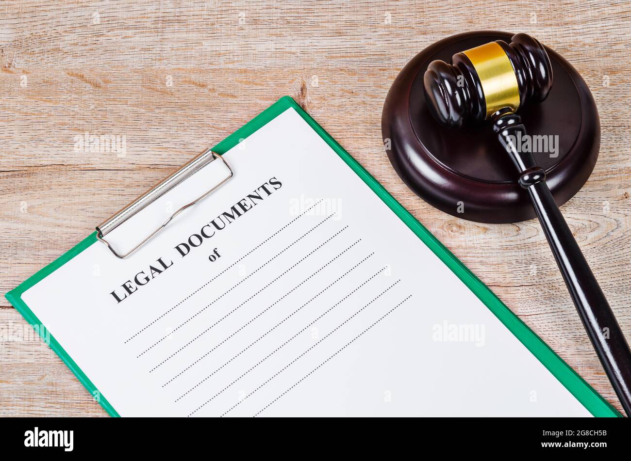 Judges gavel and legal documents file on wooden table Stock Photo Alamy