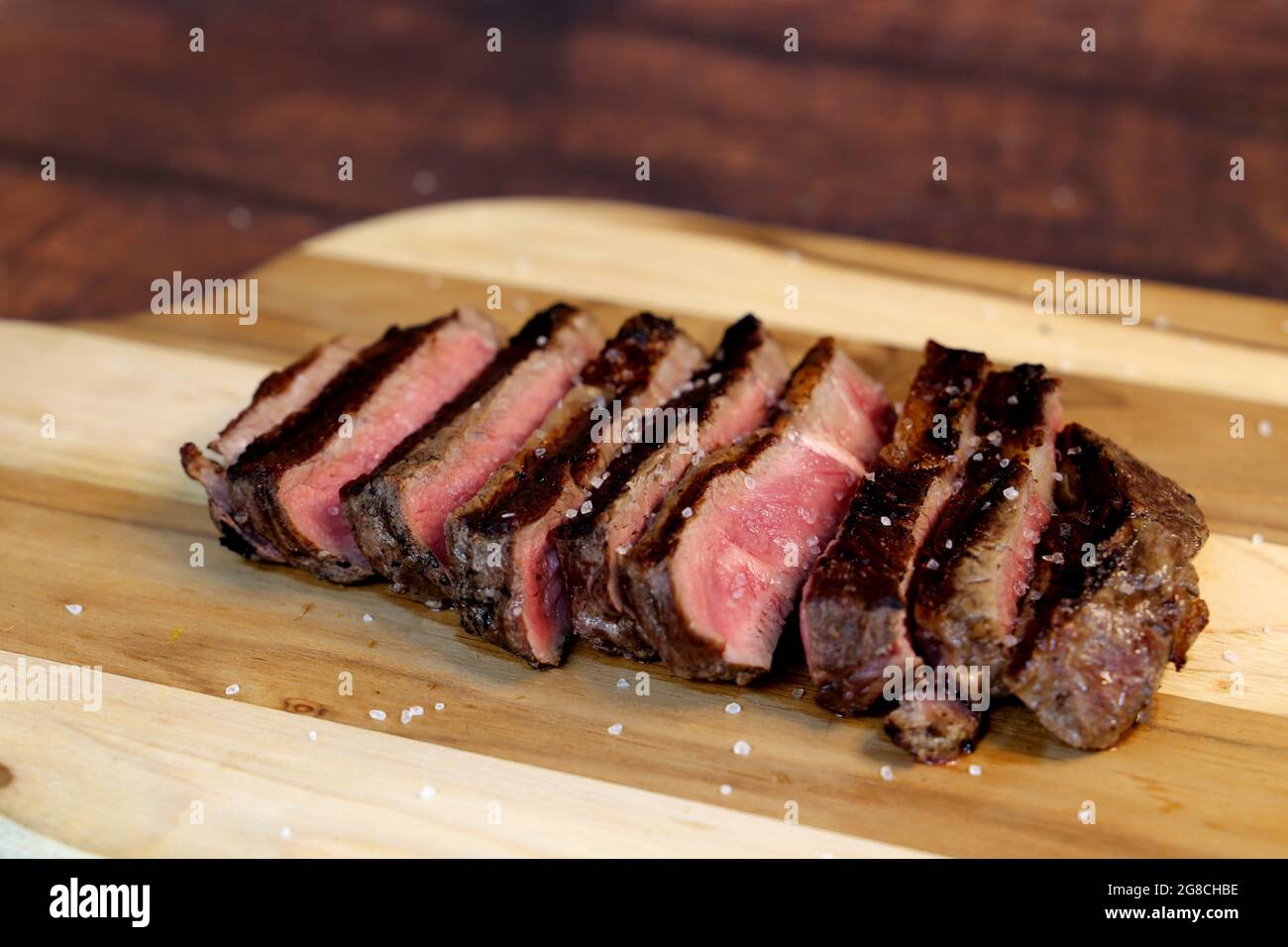 Short Rib or Costela Premium. Beautiful Steak sliced on a wooden board. Rare Steak sliced. Stock Photo
