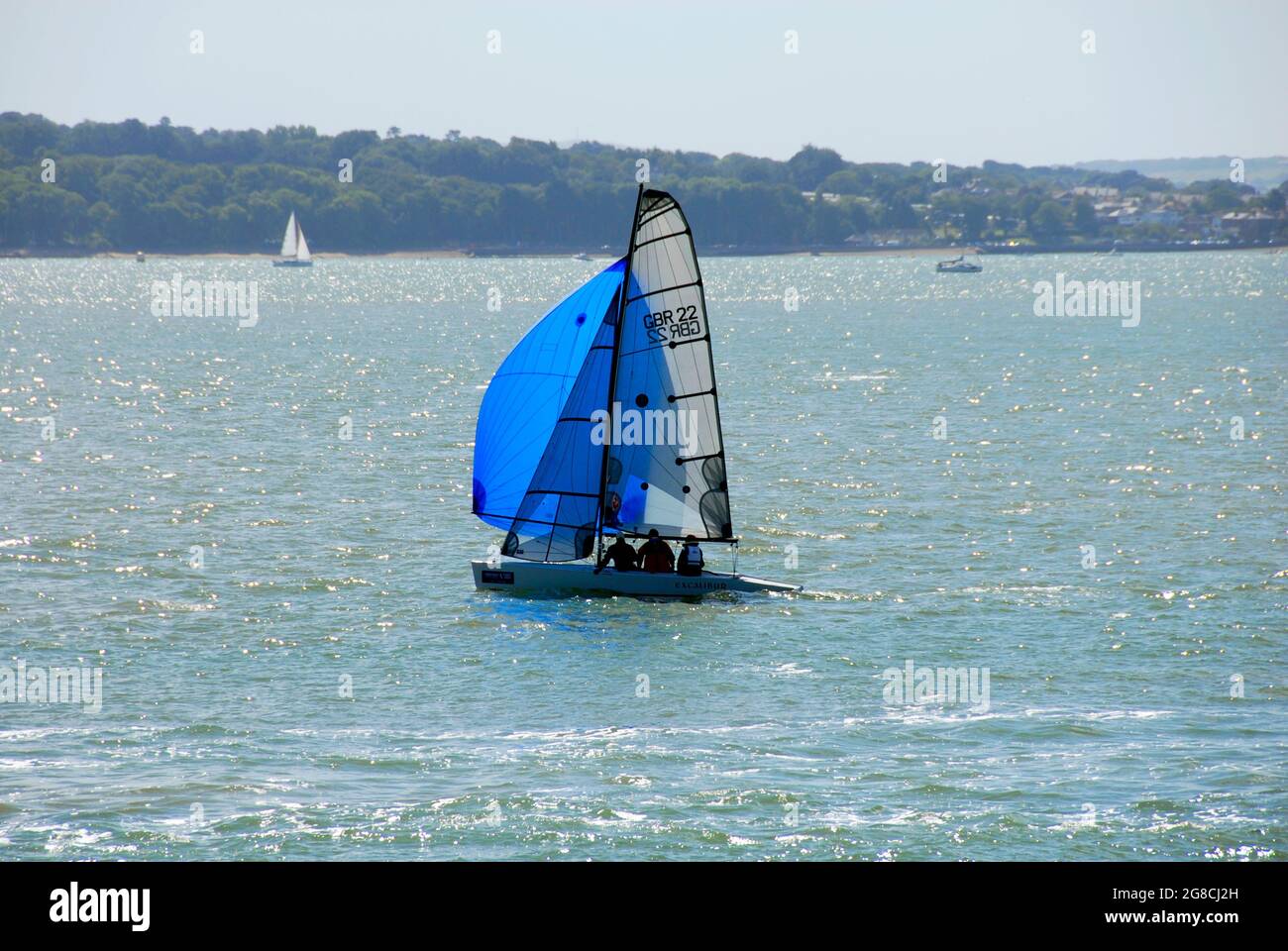 Yacht sailing in the Solent during Cowes Week Stock Photo