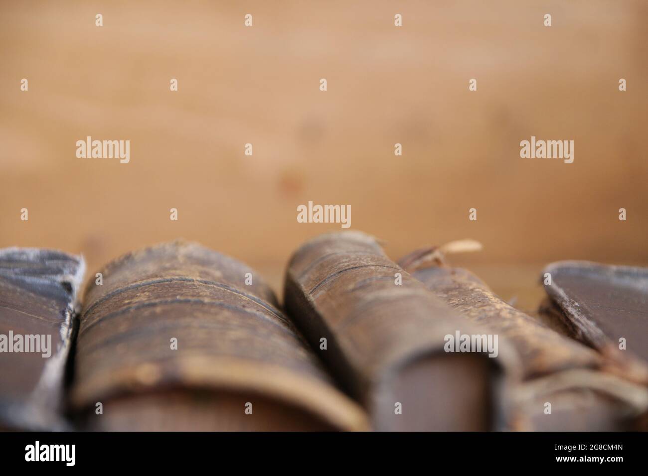 Antique books on the shelf in the library Stock Photo - Alamy