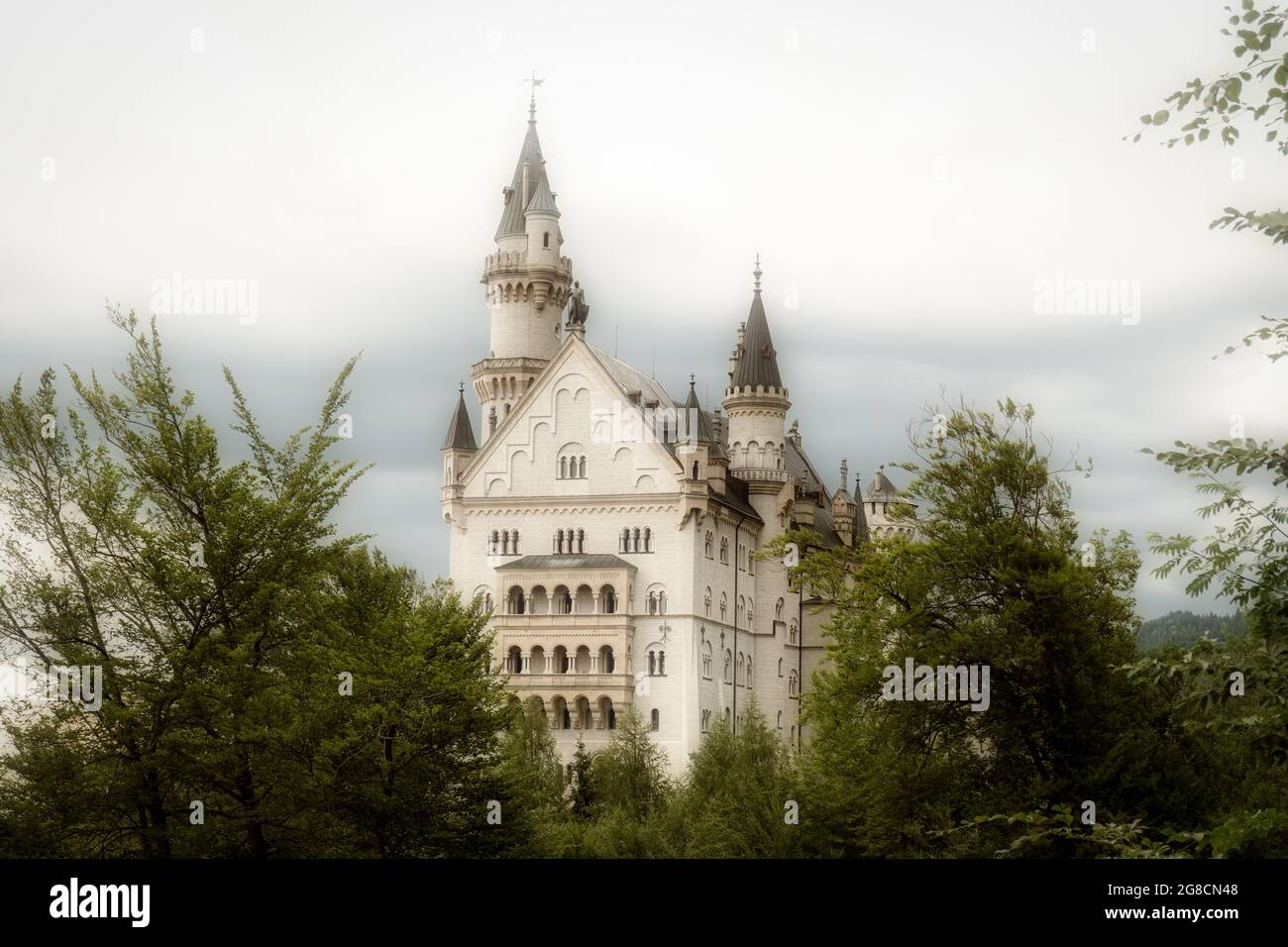 Neuschwanstein Castle in Bavaria, Germany. Very popular tourist destination in southern Germany. Truly fairytale castle, mystical and romantic. Stock Photo