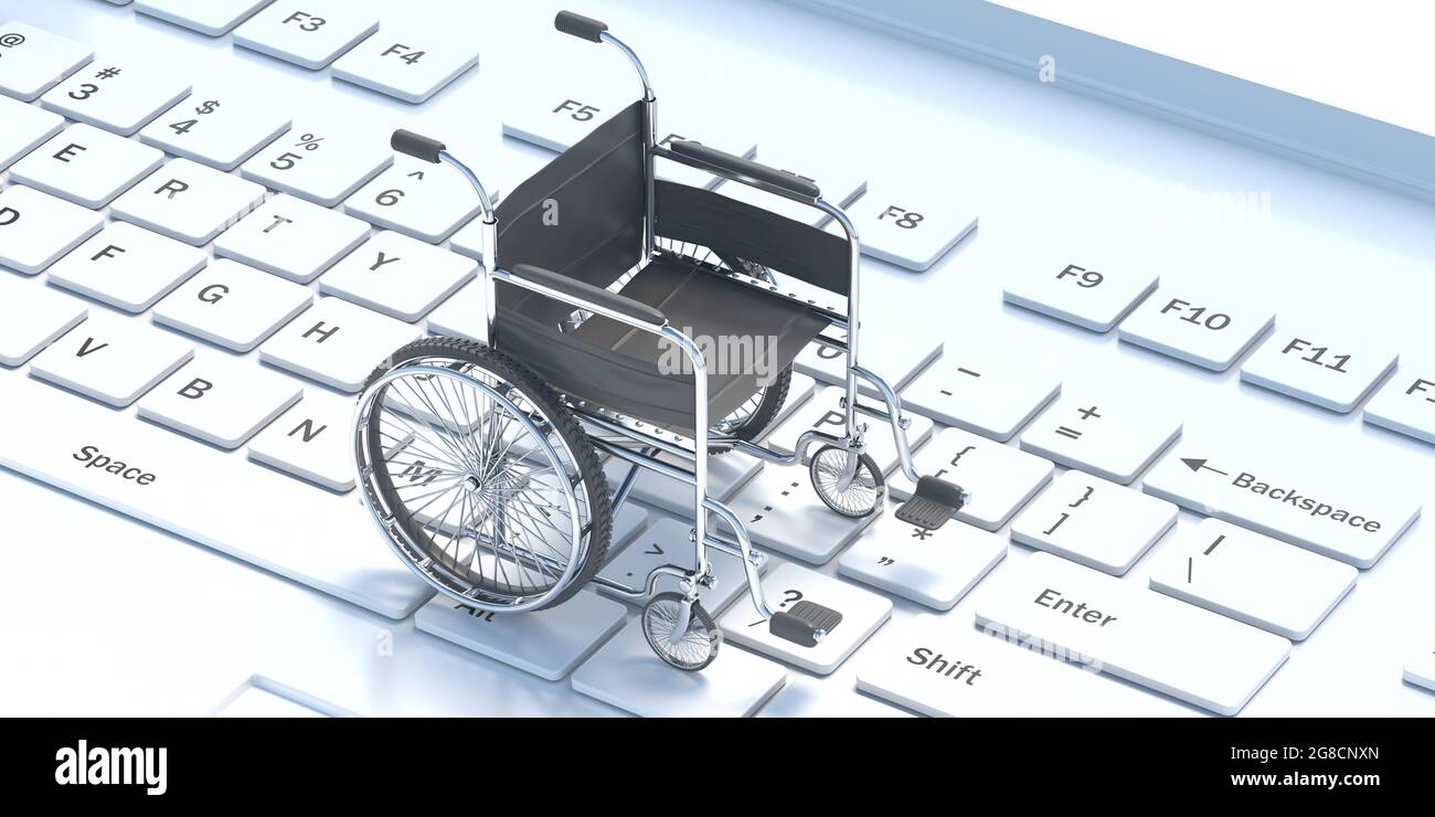 Disabled, handicapped and technology concept. Wheelchair empty on white computer laptop keyboard