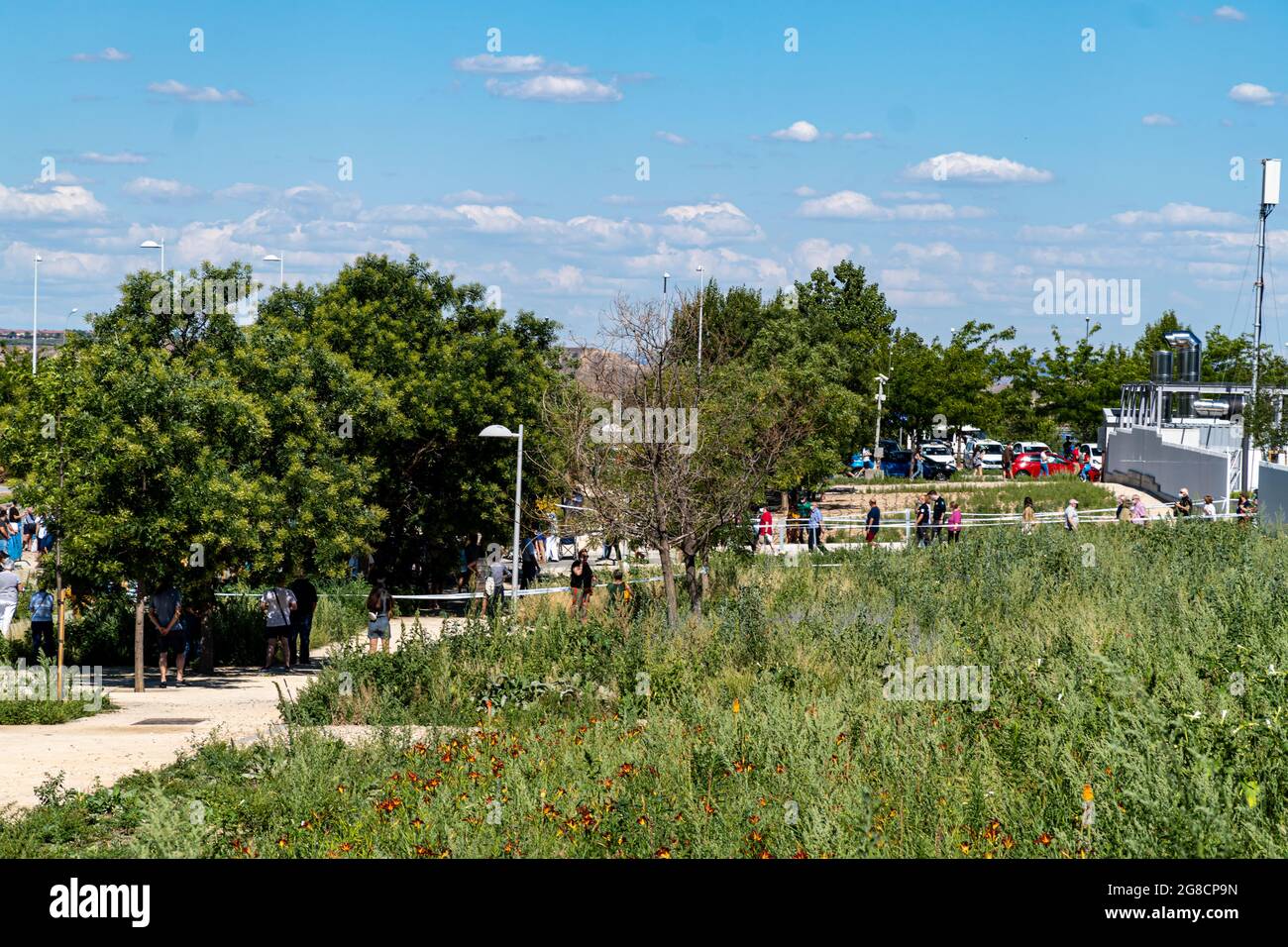 MADRID, SPAIN - Jul 07, 2021: The long lines to get vaccinated against Covid-19 outside the nurse Isabel Zendal of Valdebebas hospital Stock Photo