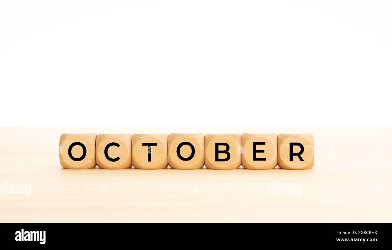 October word on wooden blocks. Copy space. White background Stock Photo ...