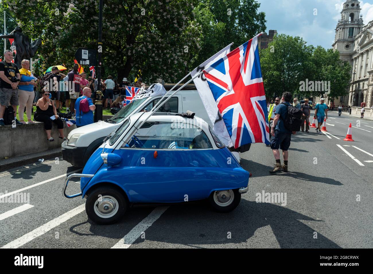 London, UK.  19 July 2021.  Vehicles brought to an anti-vaccine protest in Parliament Square, on what has been dubbed Freedom Day, when the UK government relaxed remaining coronavirus lockdown restrictions but the numbers of positive cases continues to increase daily and scientists are concerned that restrictions have been eased too soon. Credit: Stephen Chung / Alamy Live News Stock Photo