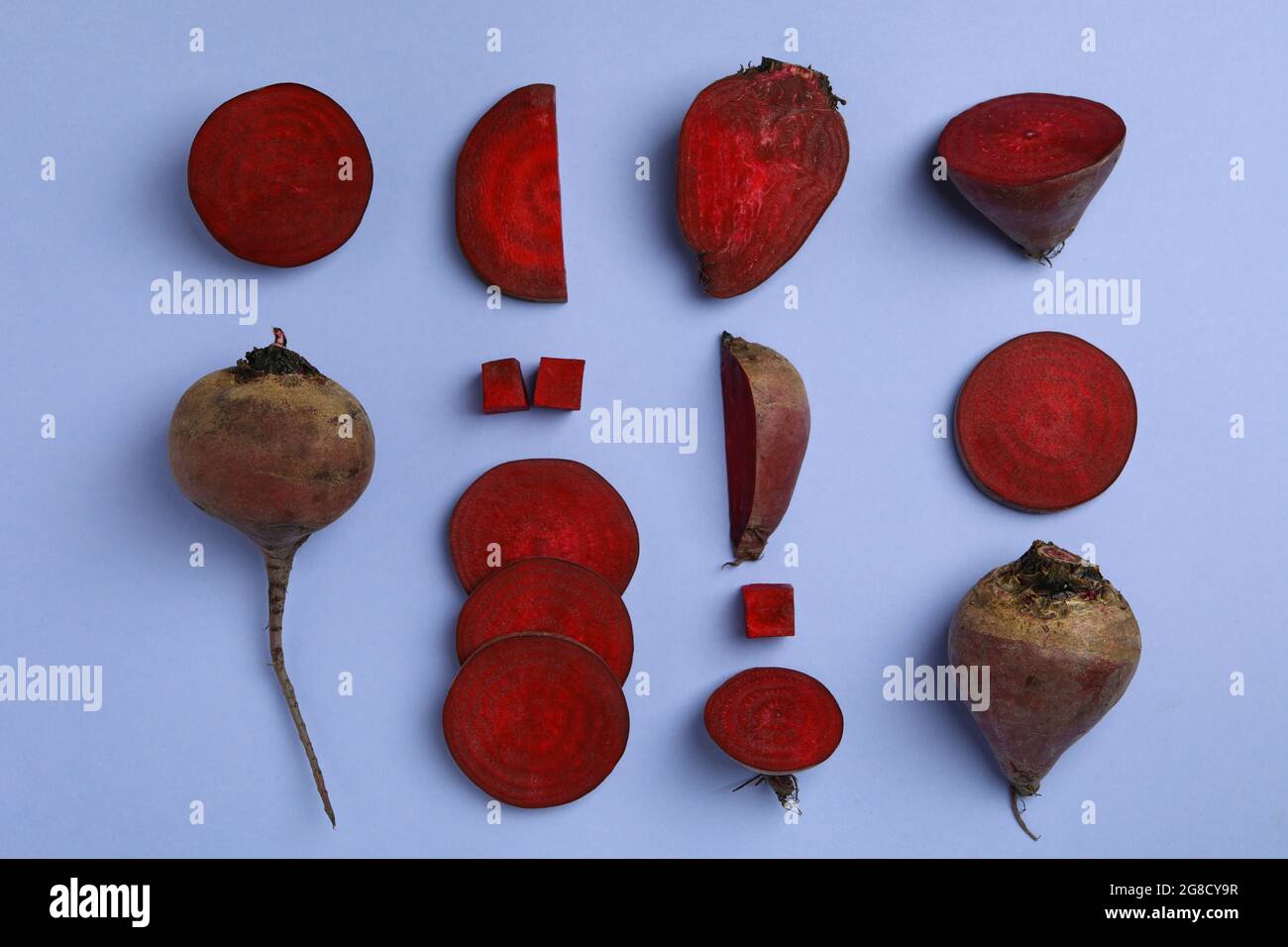 Chopped ripe red beet on violet background Stock Photo