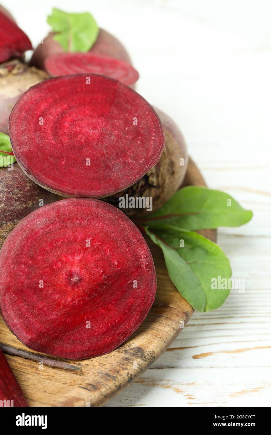 Ripe red beet on white wooden table Stock Photo