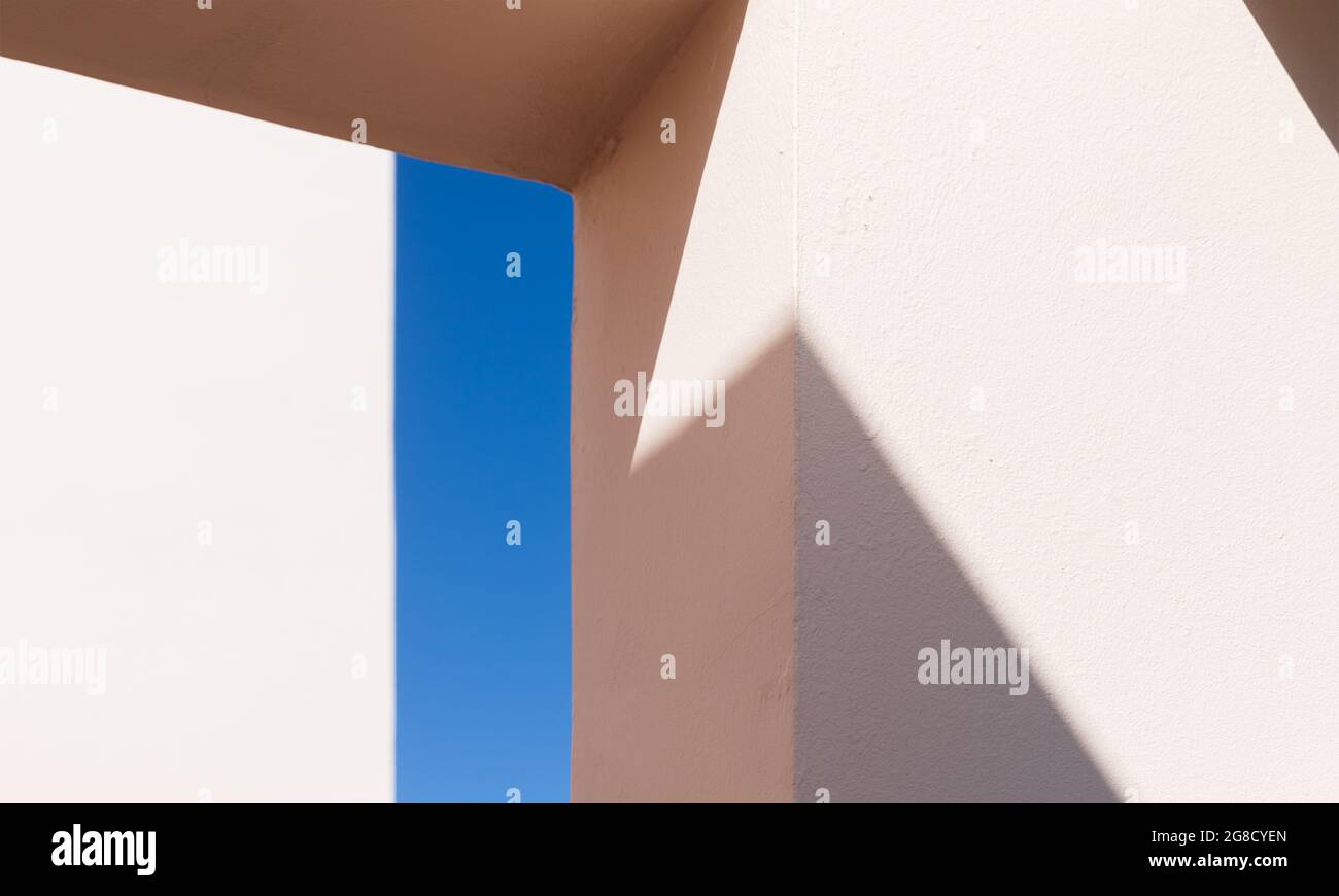 Abstract minimal architecture background photo, shadows pattern over pink facade structures Stock Photo
