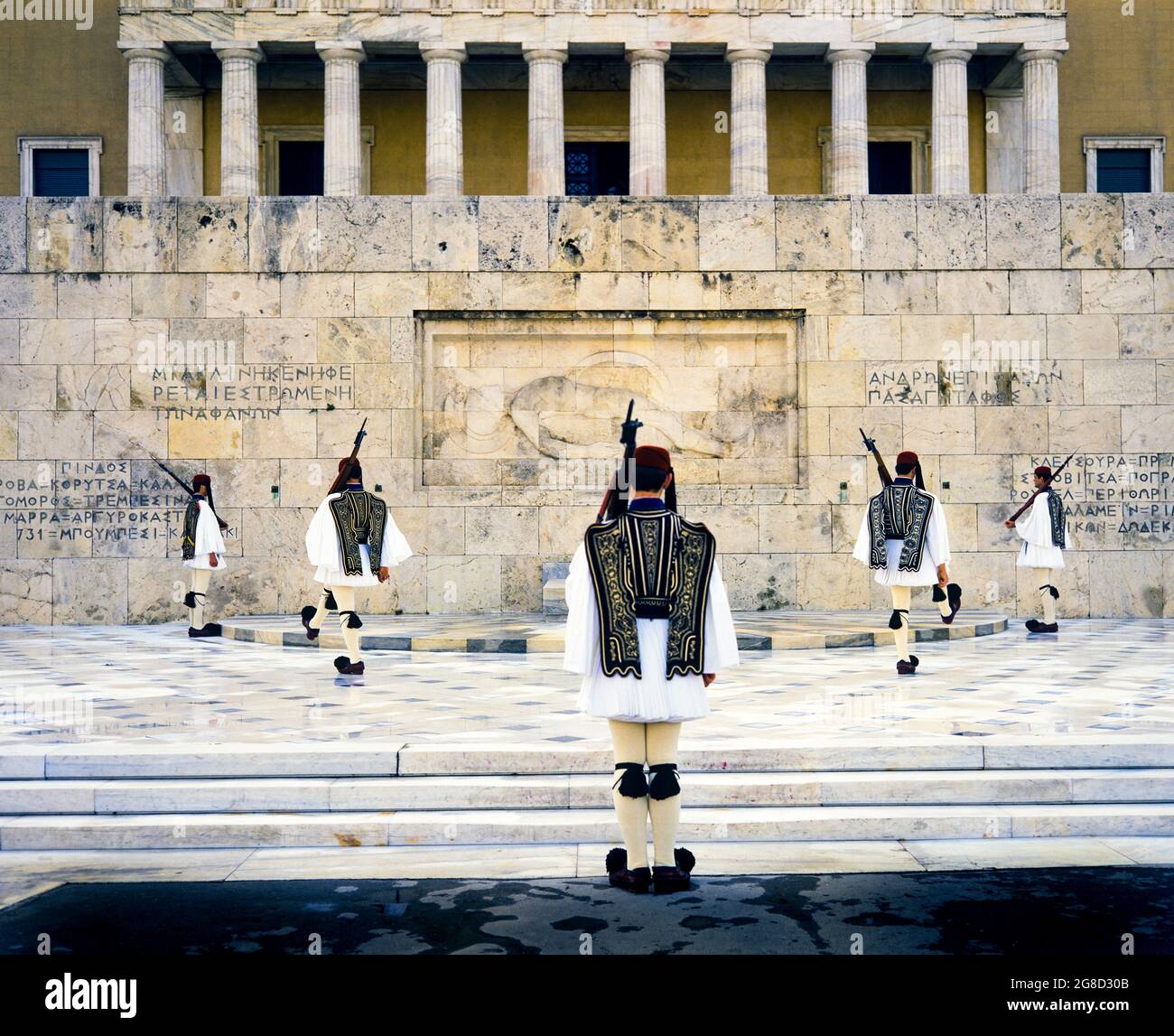 Athens, Evzones presidential guards mounting guard at the tomb of the unkown soldier monument, Vouli Greek Parliament building, Greece, Europe, Stock Photo
