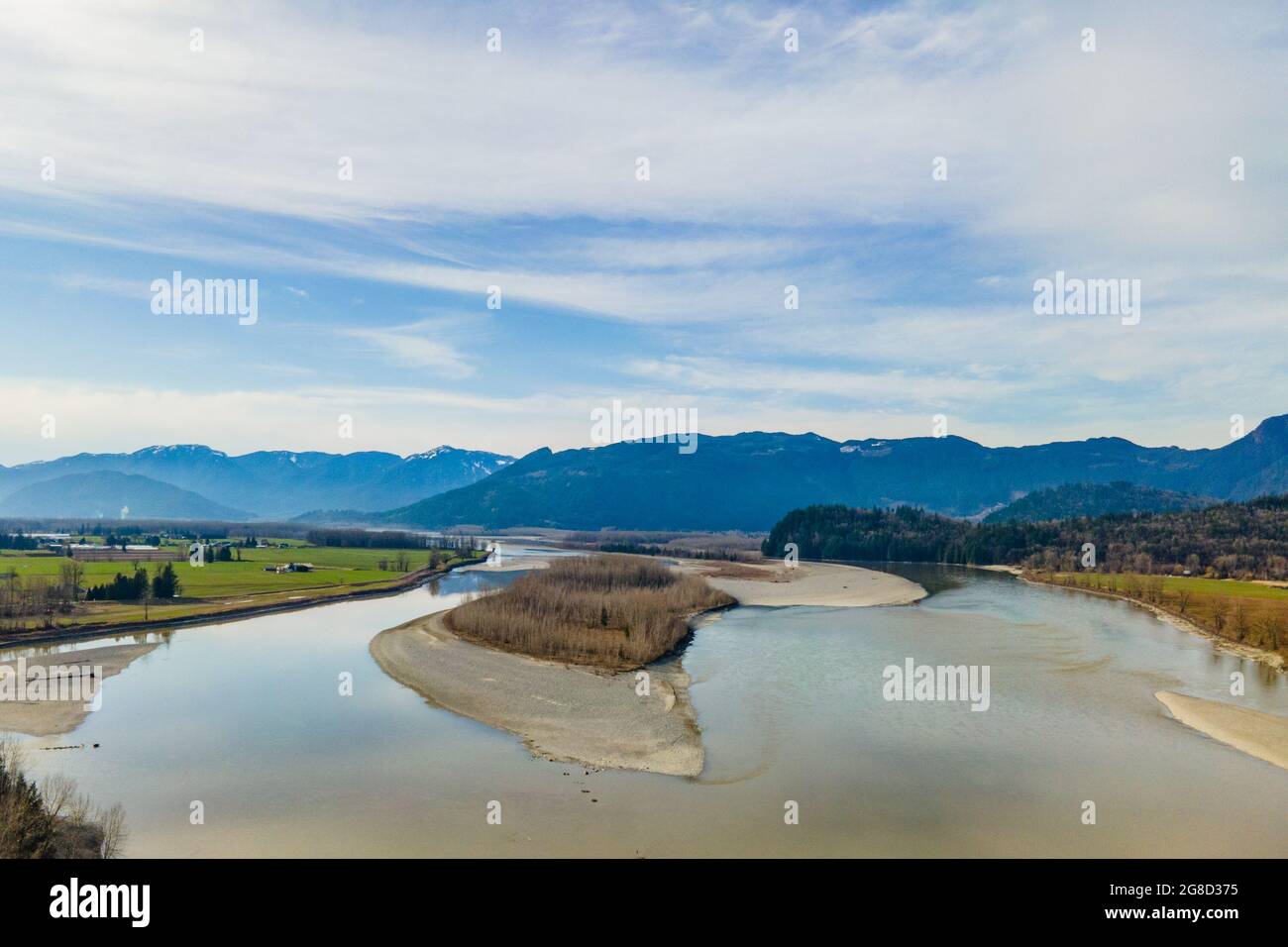Gravel bar in the lower Fraser River during summer and low water levels. Stock Photo