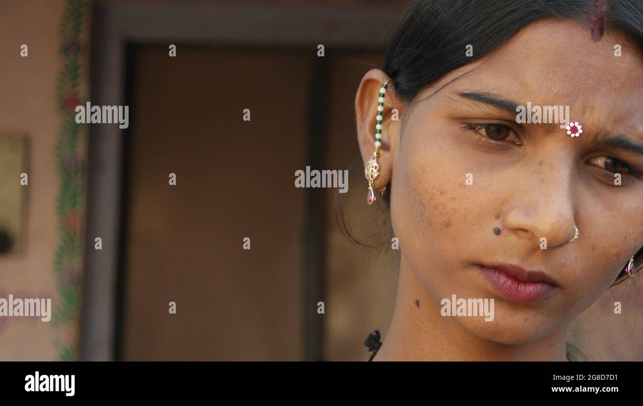 Portrait of a young Indian female with earrings and a nose piercing Stock Photo