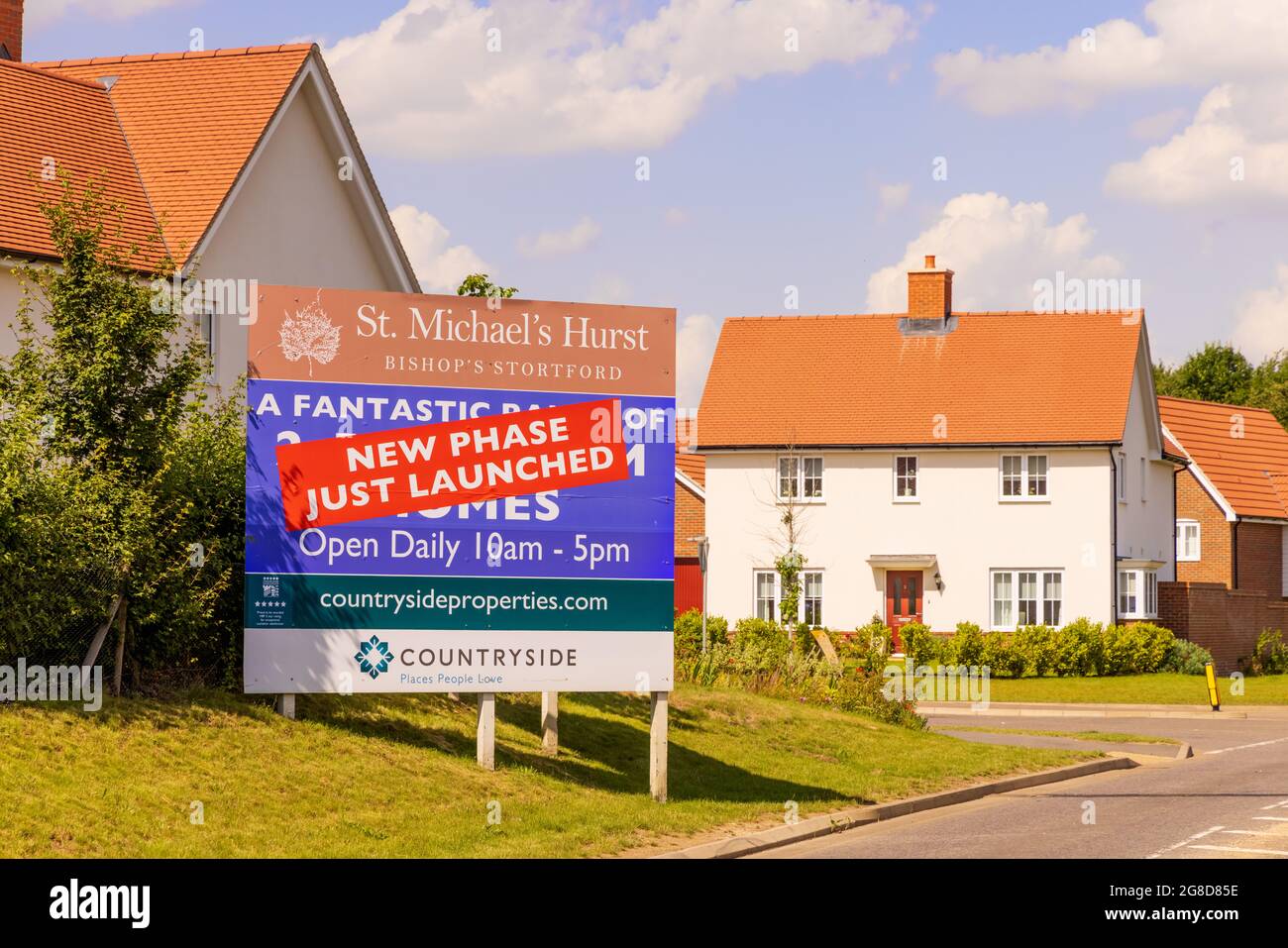 Large sign promoting new homes at a new housing development built by Countryside Properties. Hertfordshire. UK Stock Photo