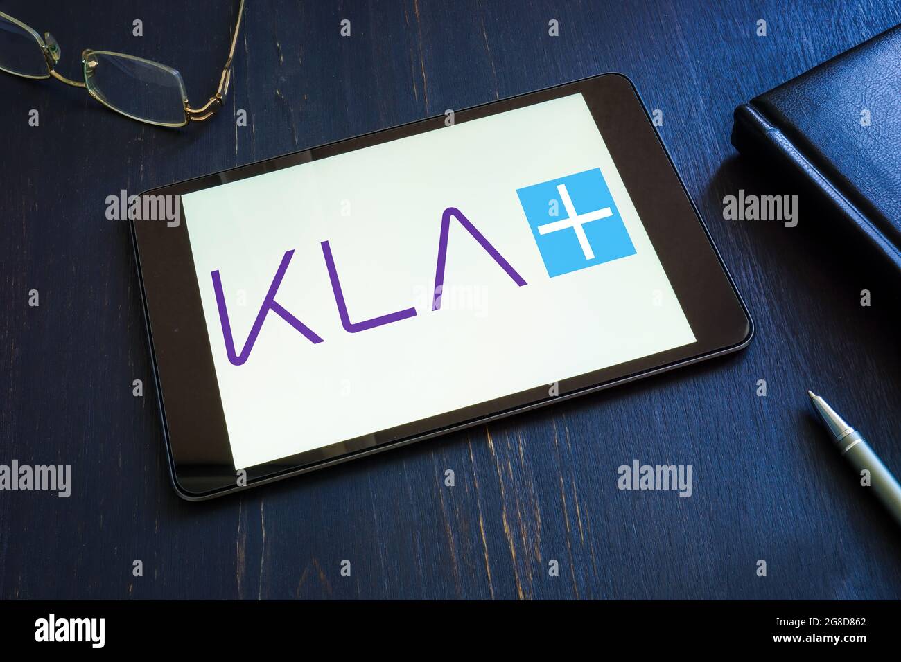 KYIV, UKRAINE - June 30, 2021. KLA Corporation logo on the tablet. Stock Photo