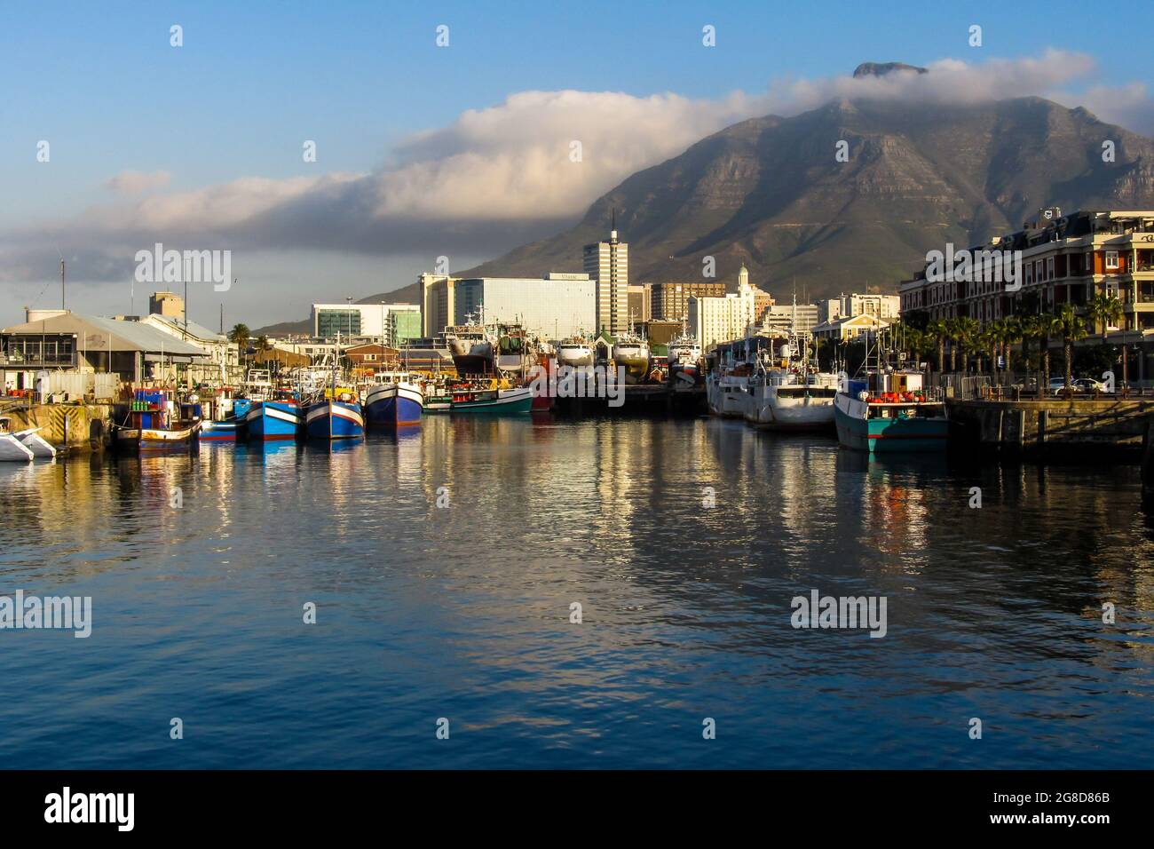 View over the bay in the V&A Waterfront, Cape Town, South Africa, with Devils Peak in the background. Stock Photo