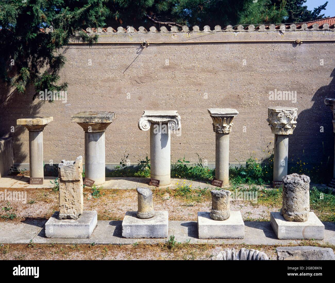 Alignment of columns with capitals displaying the ancient Greek architectural orders: Doric, Ionic, Aeolic, Corinthian, Greece, Europe, Stock Photo