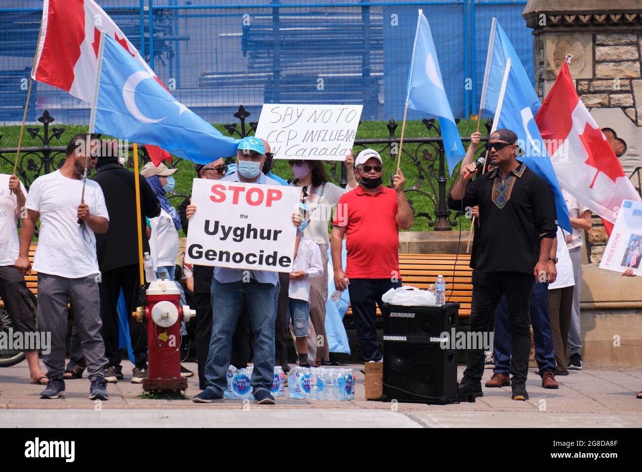 Ottawa, Canada. July 19th, 2021. Protest against the ongoing Genocide of Uyghur Muslims at the hand of the current Chinese regime in front of the Canadian Parliament. Calls for concrete actions from the government of Canada and a boycott of 2022 Winter Olympics in Beijing. Credit: meanderingemu/Alamy Live News Stock Photo