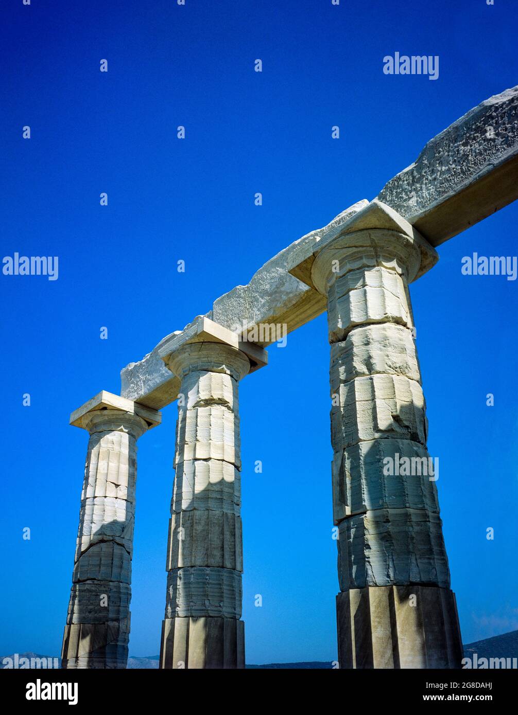 Three Doric columns, Temple of Poseidon, Cape Sounion, Attica peninsula, Greece, Europe, Stock Photo