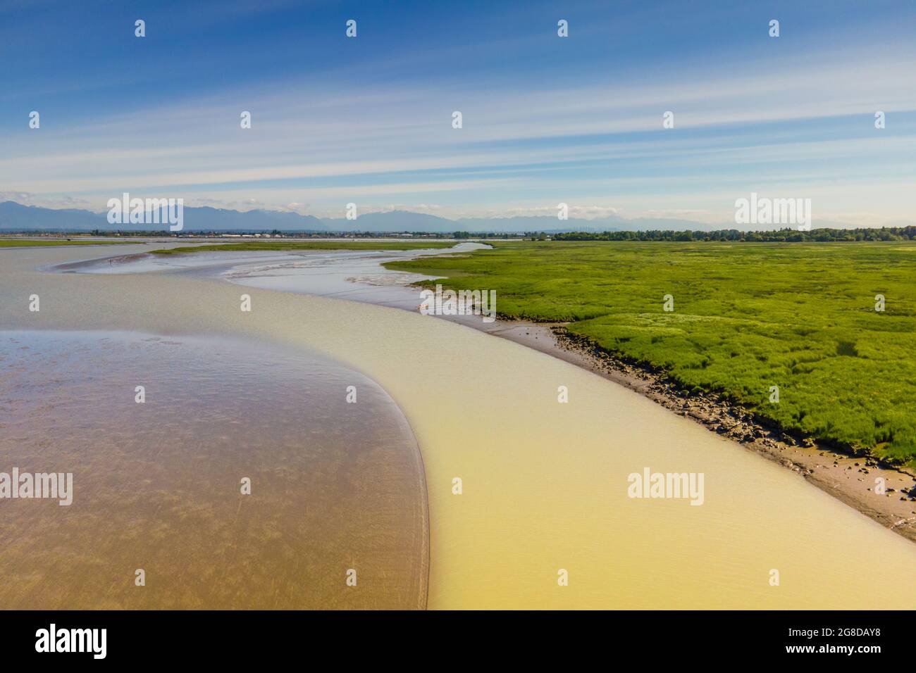 Low tide in the middle arm of the Fraser river close to the Vancouver international Airport. Stock Photo