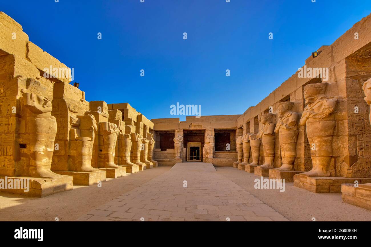 The pillars of Osiris that make up the portico in the courtyard of the ...