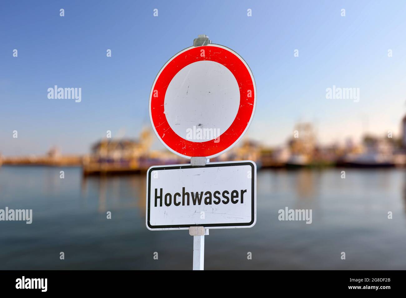 German water flood sign with red circle and text saying 'Hochwasser' Stock Photo