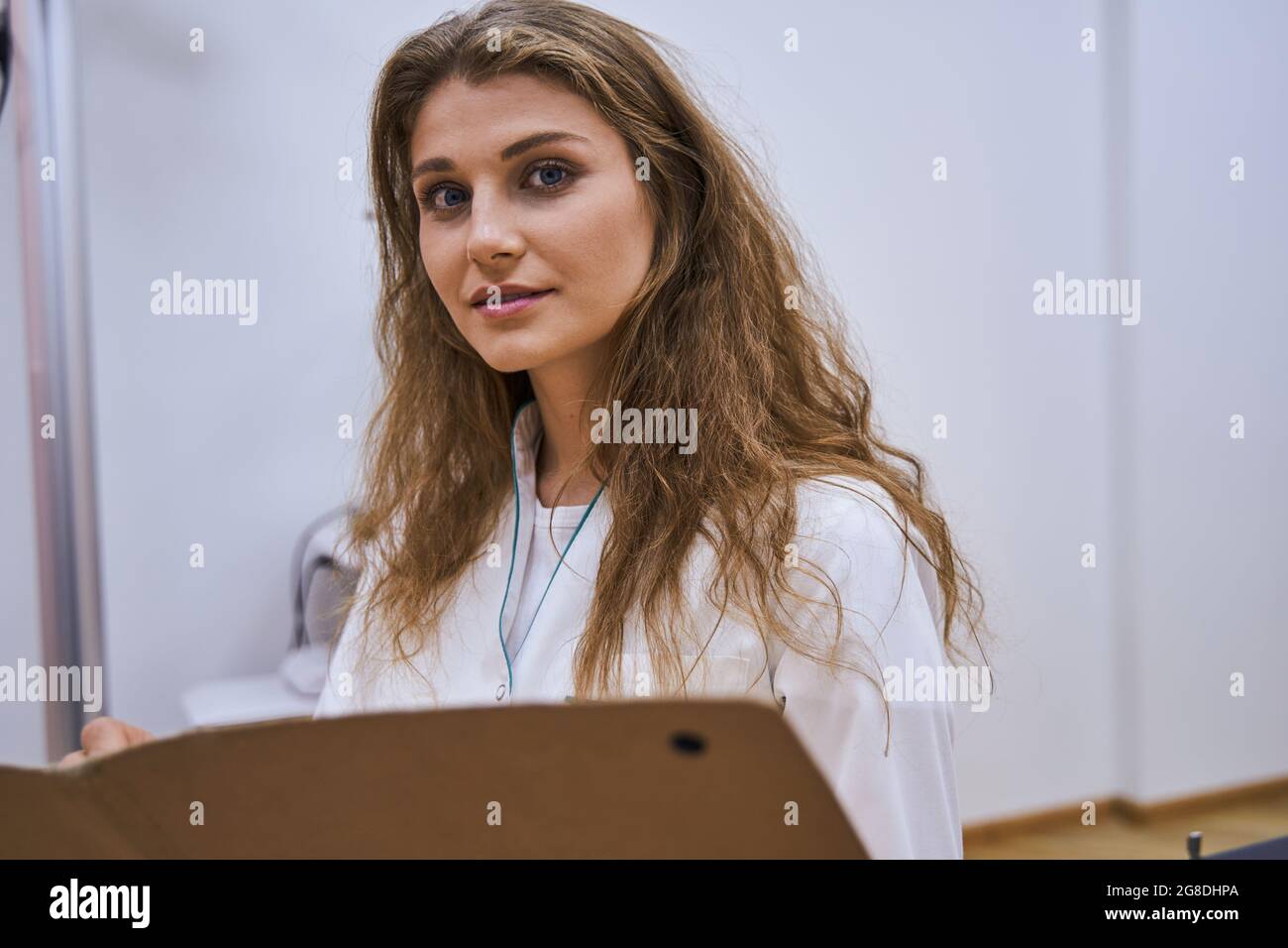 Close up charming female doctor hi-res stock photography and images - Alamy