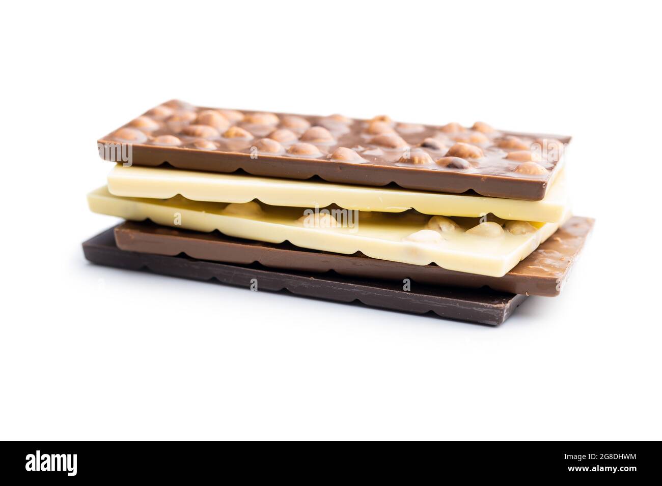 Chocolate bars with hazelnuts isolated on white background. Stock Photo