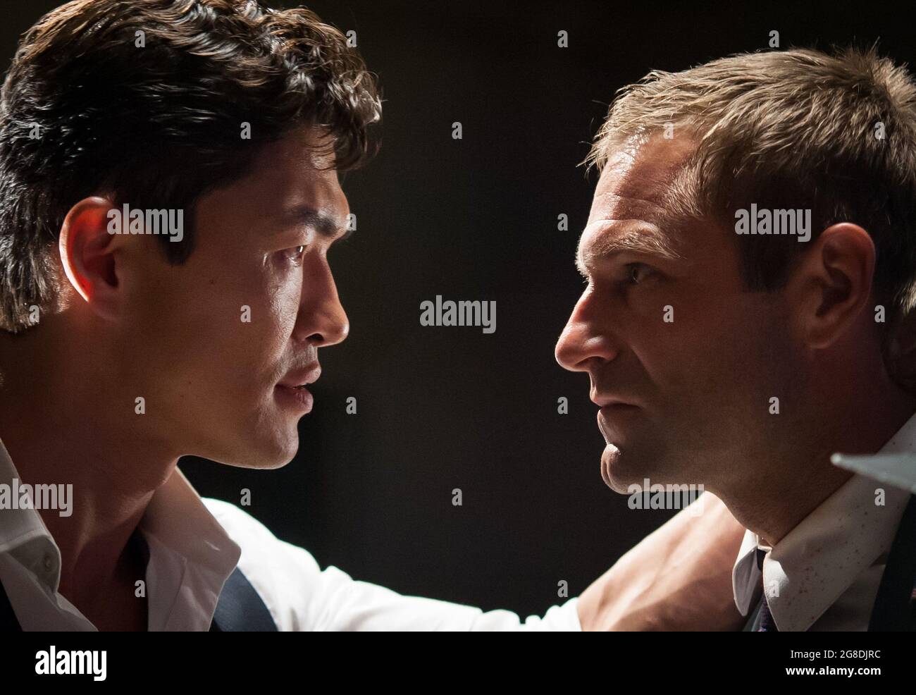 New York, USA. Aaron Eckhart and Rick Yune in the ©FilmDistrict new movie:  Olympus Has Fallen (2013). PLOT: Disgraced former Presidential guard Mike  Banning finds himself trapped inside the White House in