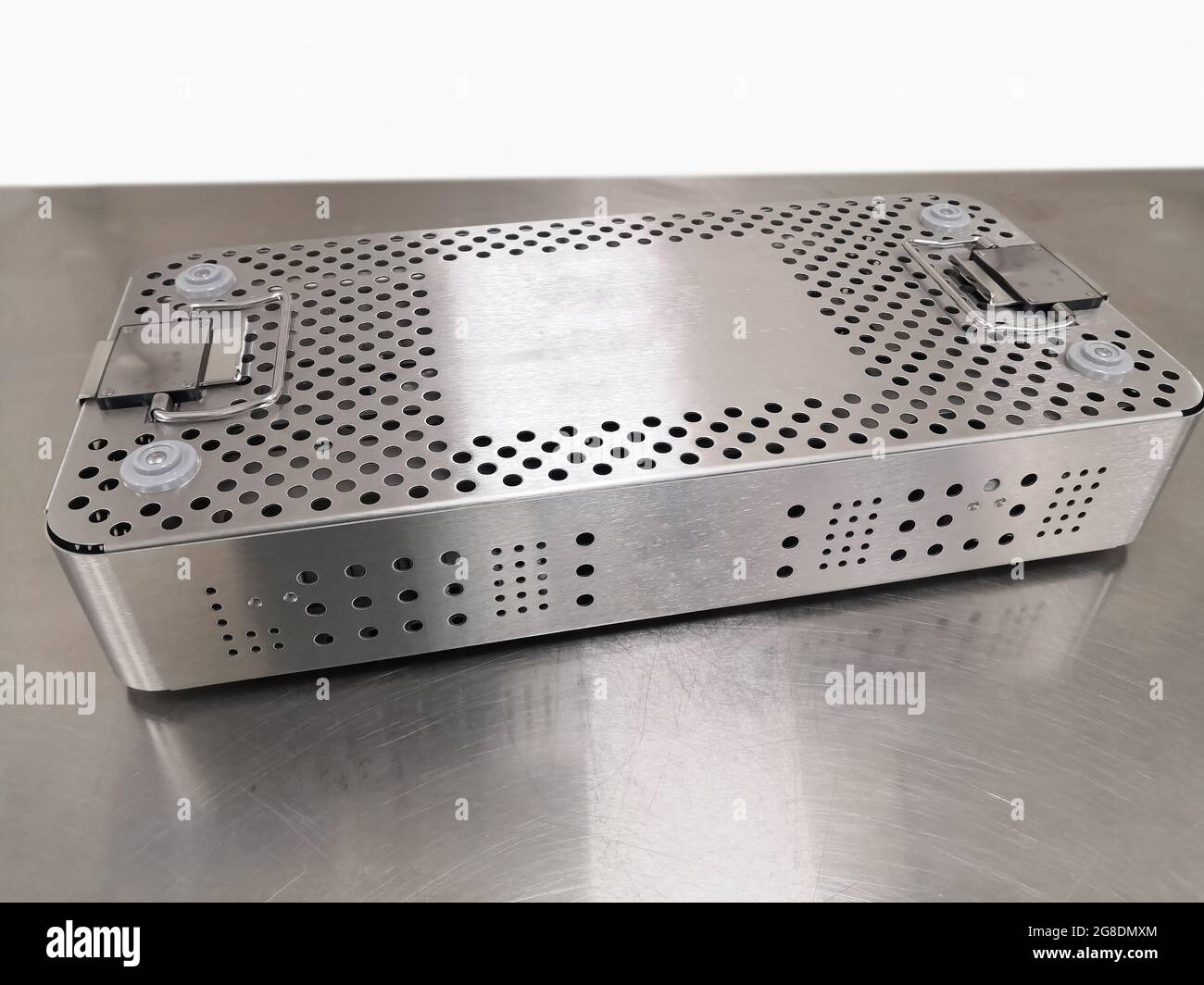 Closeup Image Of Steel Sterilization Tray. Using For Pack And Sterilize Surgical Instrument. Selective Focus Stock Photo