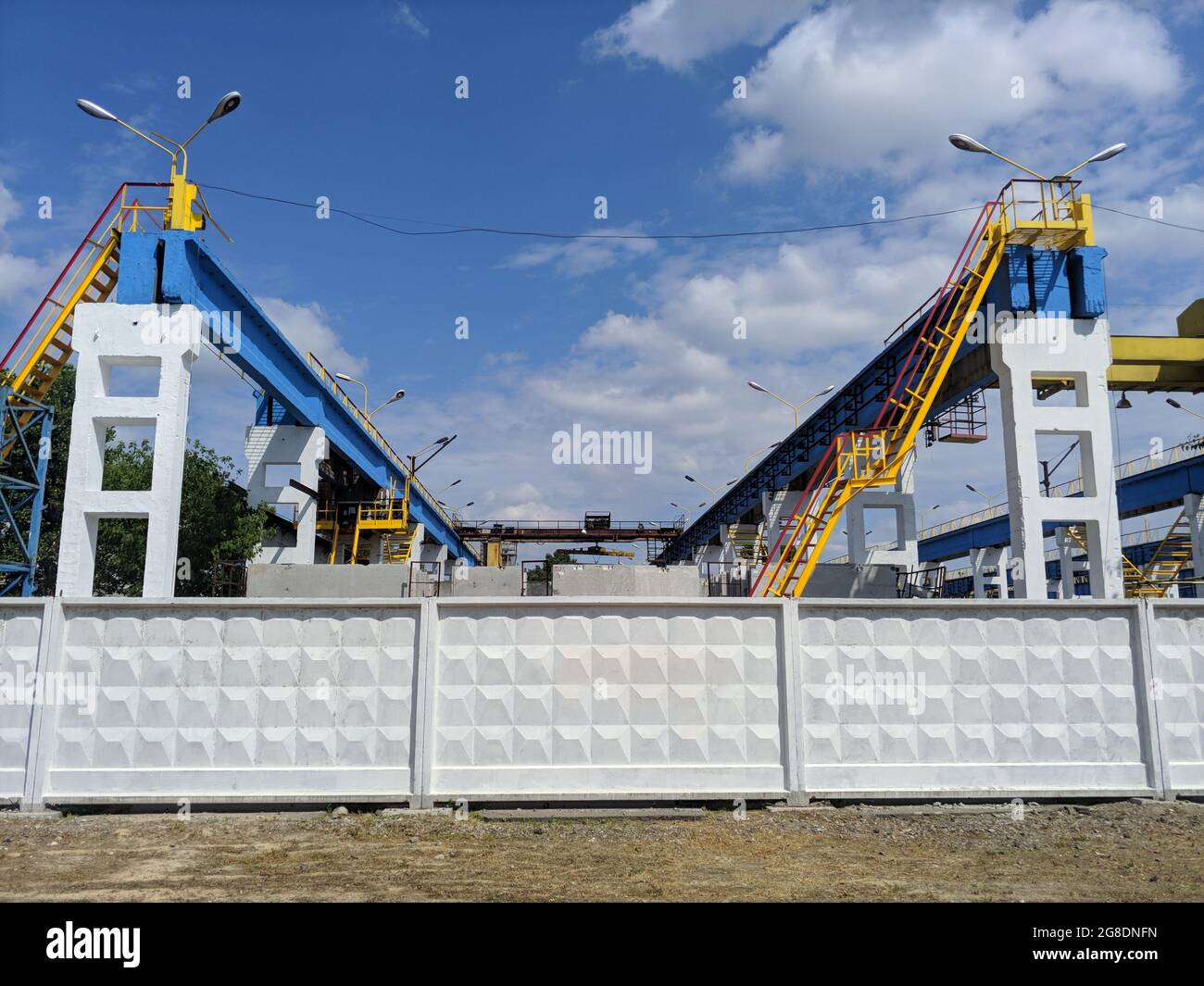 automatic robotic cranes at industrial facility factory. heavy ...