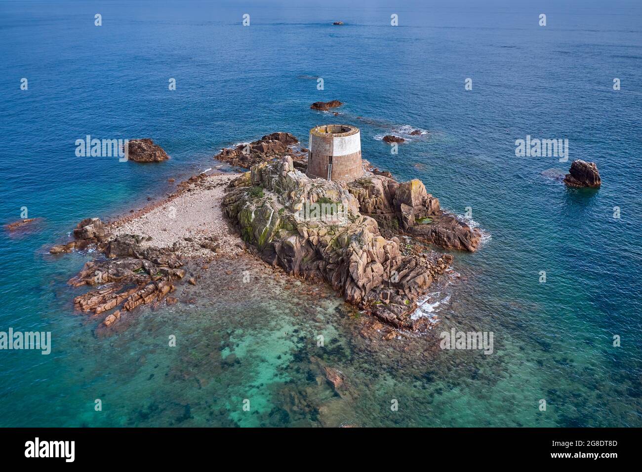 Aerial drone image of Icho Tower at high tide in the sunshine. Jersey Channel Islands. Stock Photo