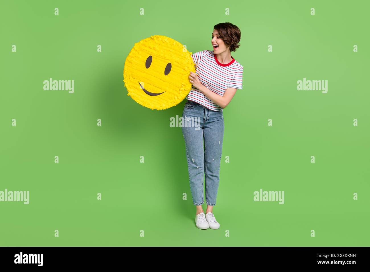 Full Length Body Size View Of Pretty Cheerful Girl Holding In Hands Emoji Sticker Opinion Isolated Over Green Pastel Color Background Stock Photo Alamy Full Length Body Size View Of Pretty Cheerful Girl Holding In Hands Emoji Sticker Opinion Isolated Over Green Pastel Color Background Stock Photo Alamy