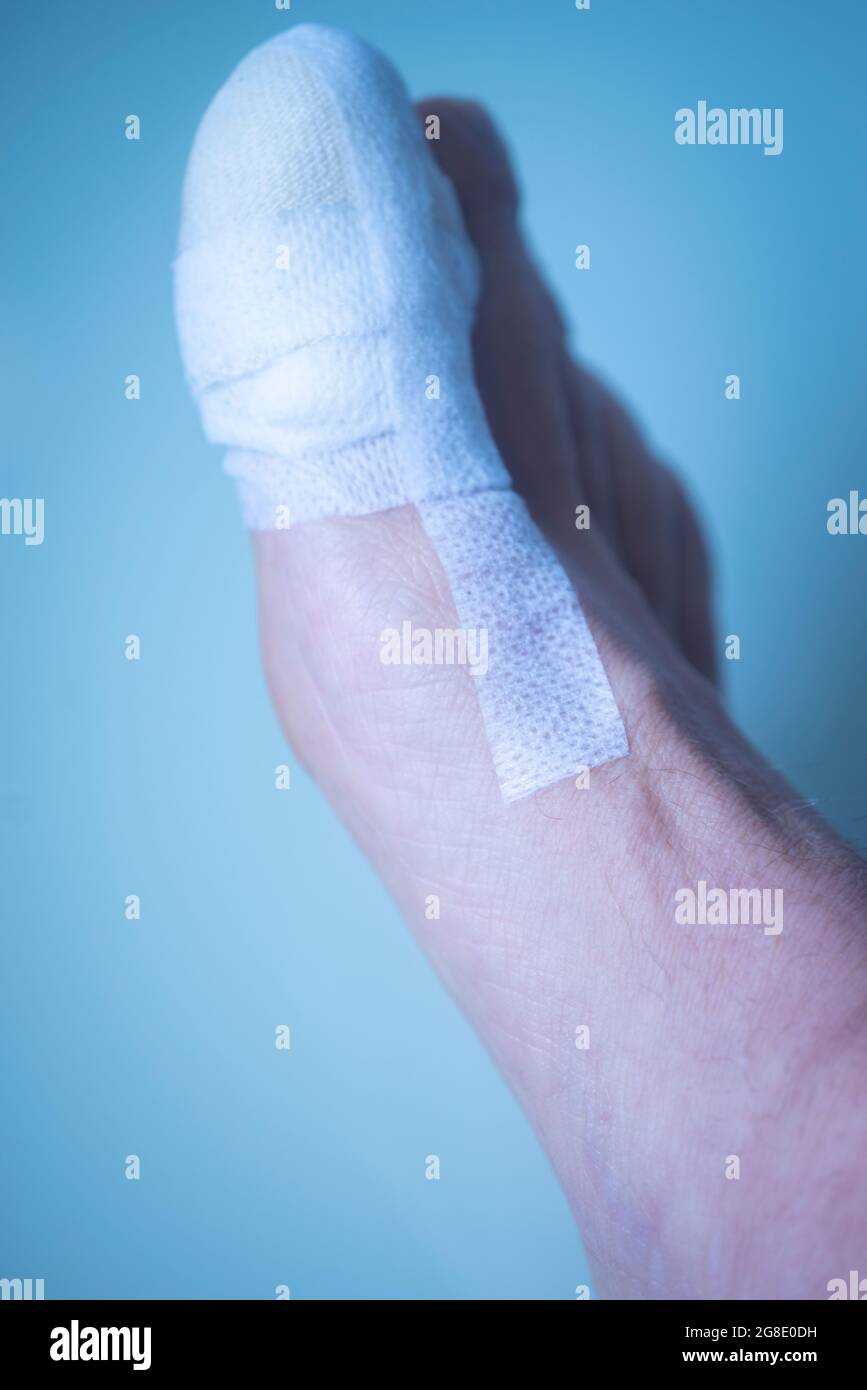 Foot big toe bandage injured feet in medical clinic hospital center