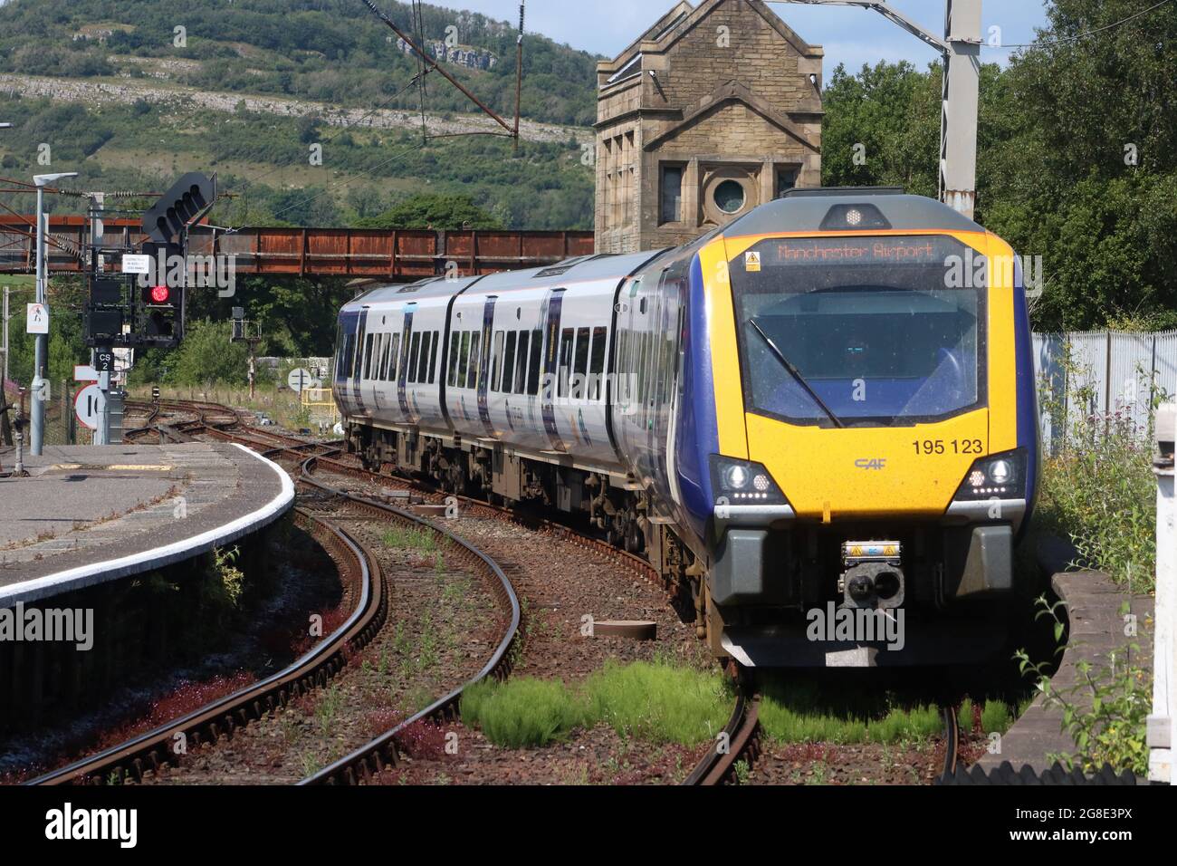Northern civity diesel multiple-unit train arriving Carnforth railway station with Barrow-in-Furness to Manchester Airport service, 19th July 2021. Stock Photo