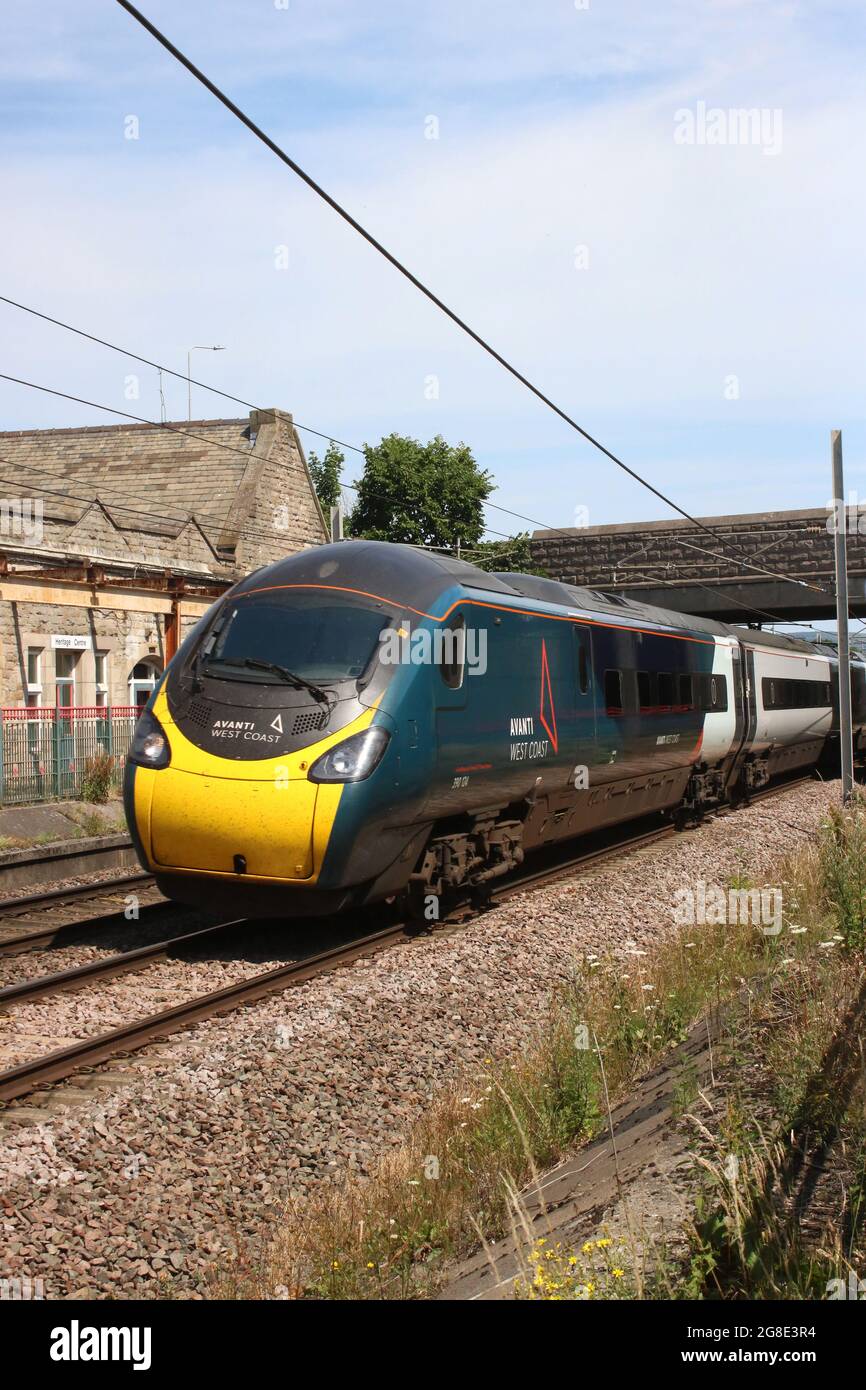 Avanti West Coast pendolino electric multipleunit passing through Carnforth on the West Coast