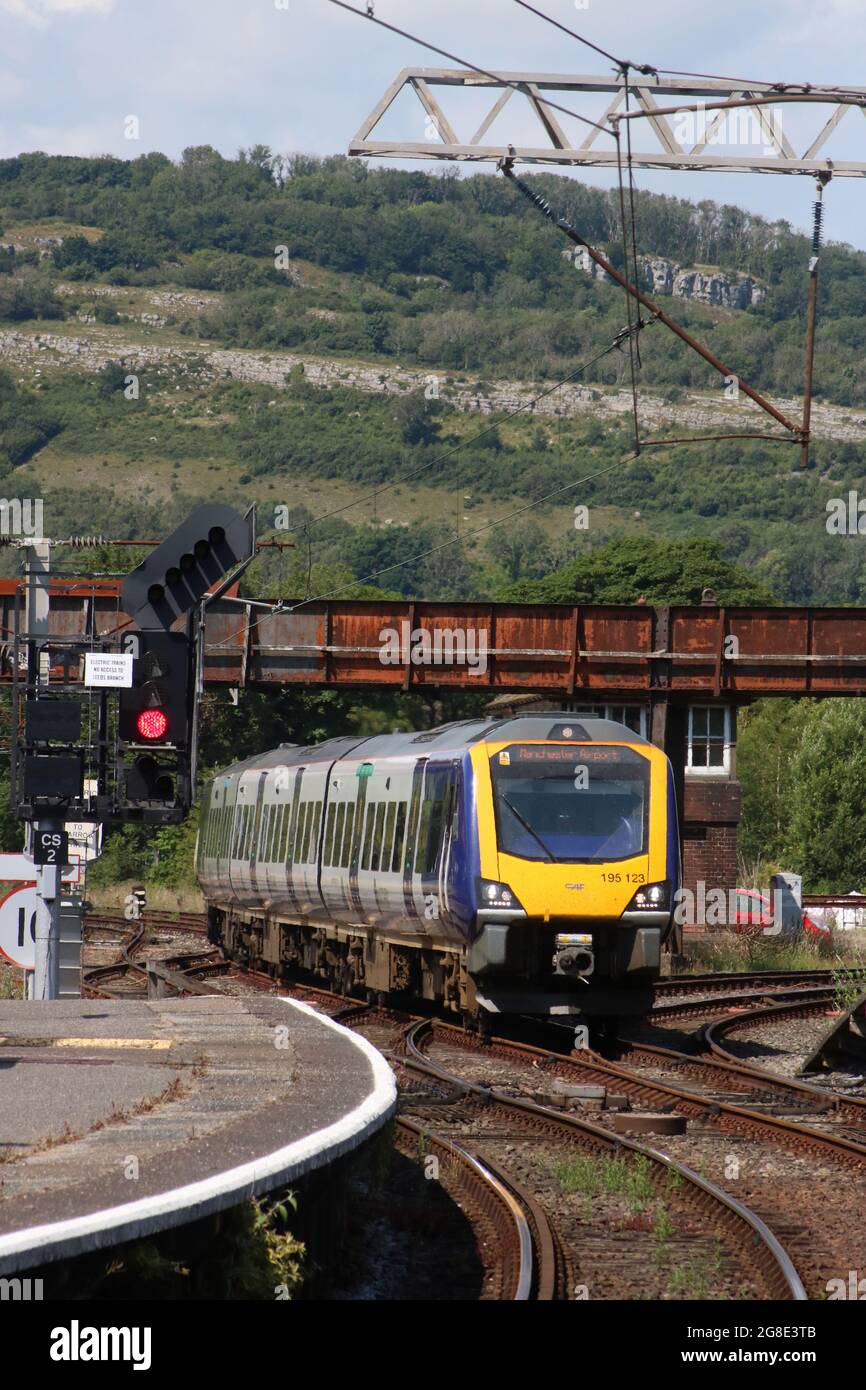 Northern civity diesel multipleunit train arriving Carnforth railway station with Barrowin