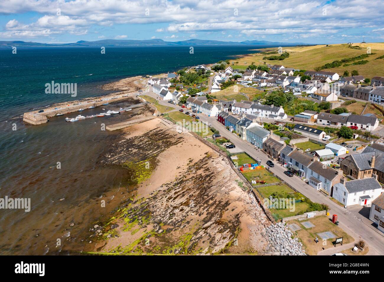 Aerial view from drone of Portmahomack village and beach, on Tarbat peninsula, Easter Ross, Scotland, UK Stock Photo