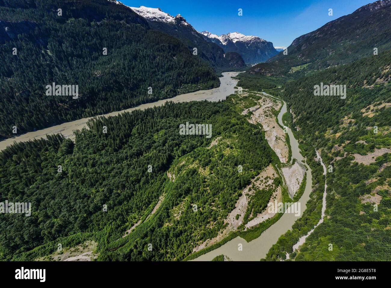Squamish River with heavily silted waters from glaciers melting during the peak of freshet. Stock Photo