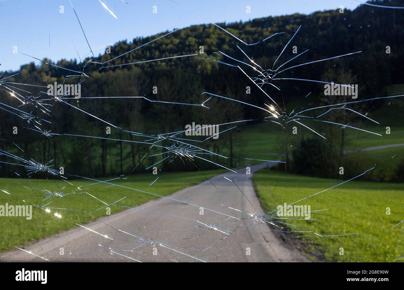 Shattered windscreen due to hailstones on a car, hail damage, Austria Stock Photo