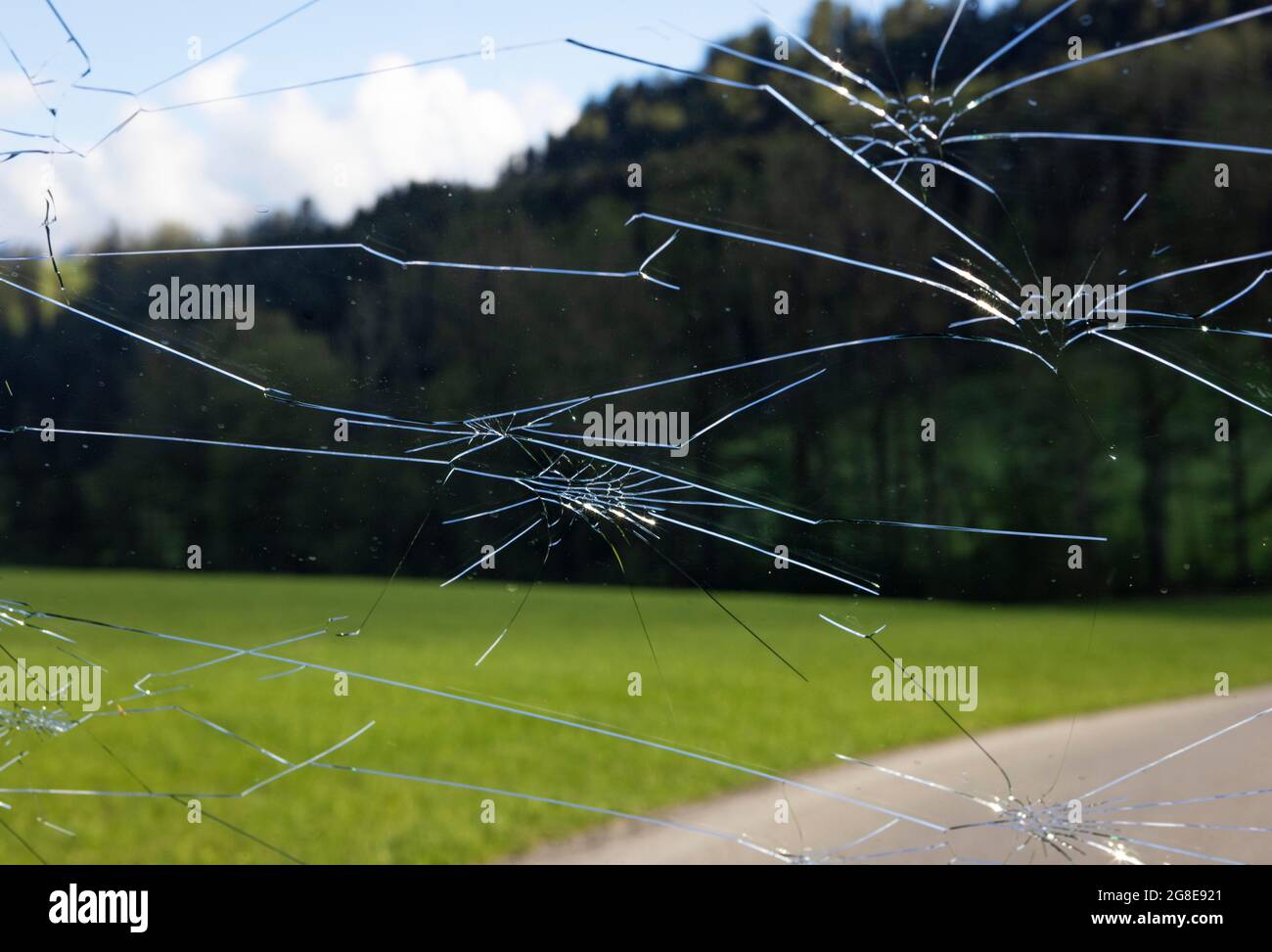 Shattered windscreen due to hailstones on a car, hail damage, Austria Stock Photo