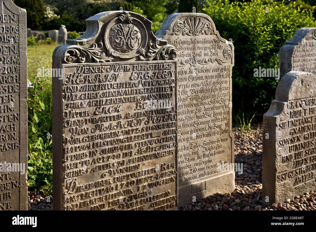 Talking gravestones at the cemetery of the St. Clemens church, Nebel, Amrum, Nordfriesland, Schleswig-Holstein, Germany Stock Photo