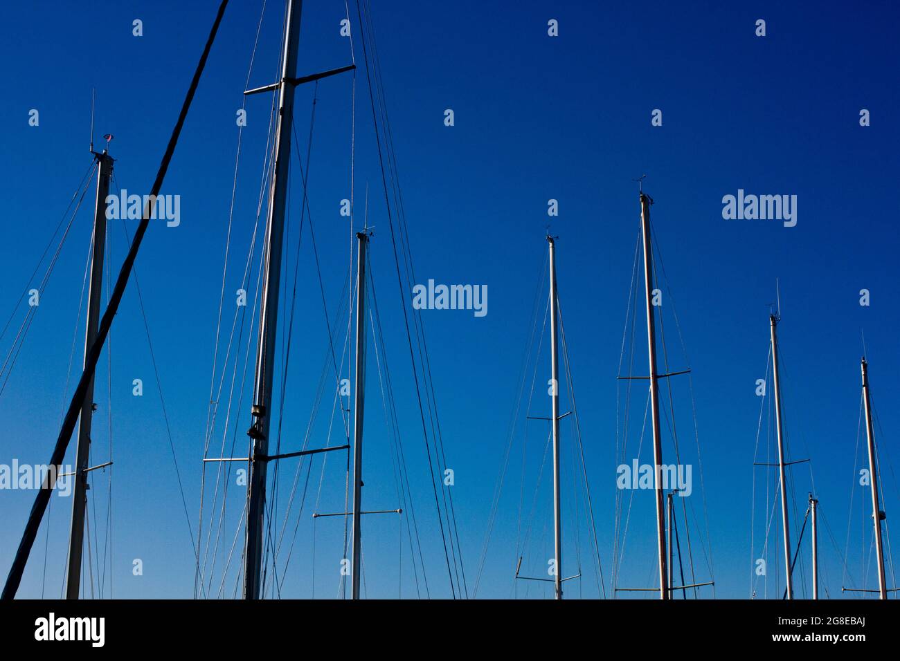 Masts of boats at anchor in Cania's Old Venetian Harbour on the island of Crete, Greece Stock Photo