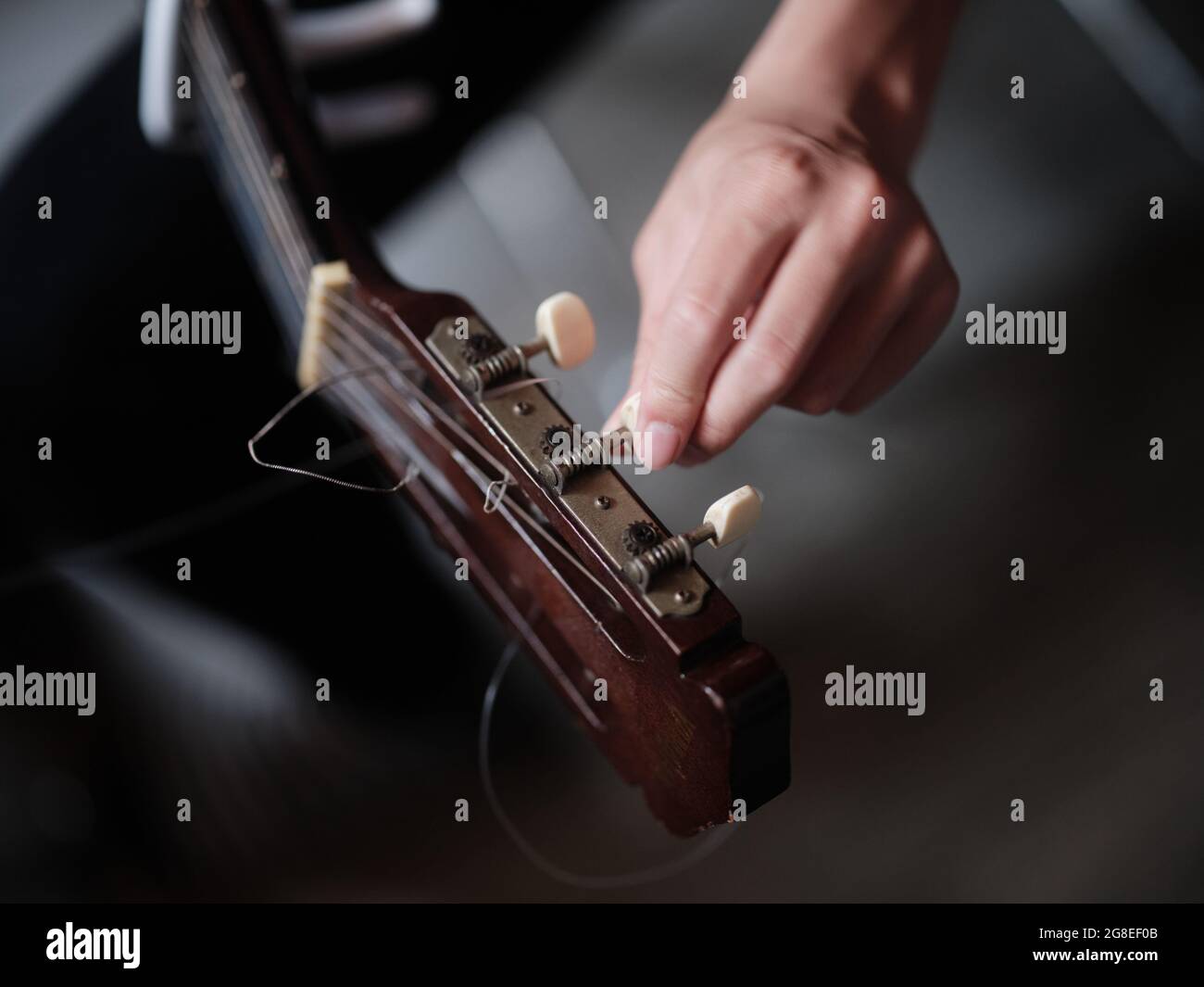 Tuning Guitar Stock Photo