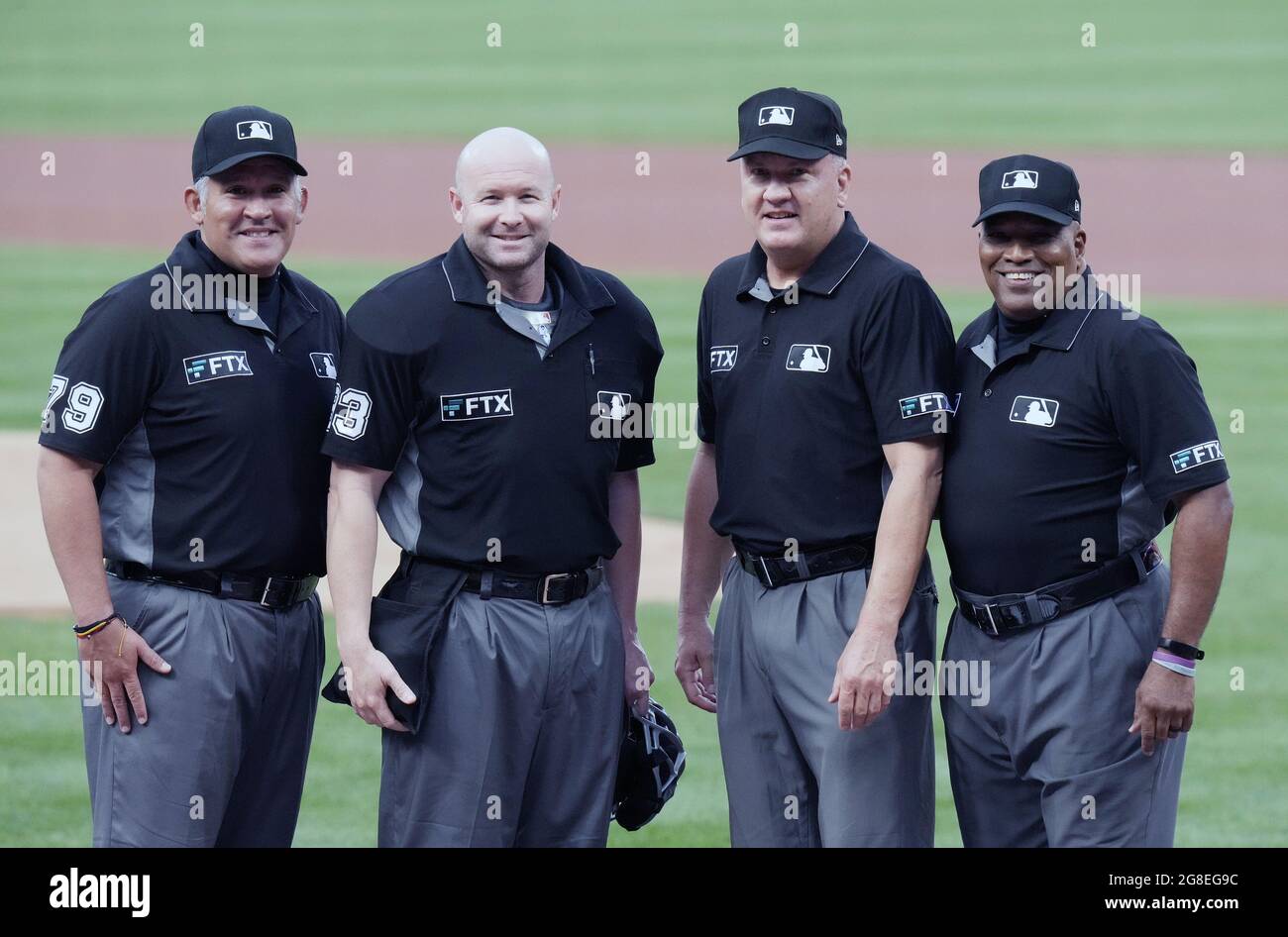 St. Louis, United States. 19th July, 2021. Major League umpires (L to R) Manny Gonzalez, Mike Estabrook, Jeff Nelson and Laz Diaz, pose for a photograph before the Chicago Cubs-St. Louis Cardinals baseball game at Busch Stadium in St. Louis on Monday, July 19, 2021. Photo by Bill Greenblatt/UPI Credit: UPI/Alamy Live News Stock Photo