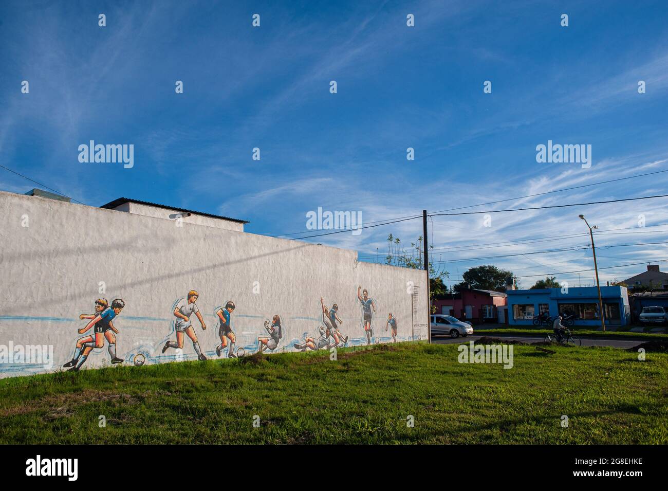 Firmat, Argentina. 12th May, 2018. A mural celebrating the figure of the late football legend Diego Armando Maradona is seen in Firmat. The mural by artist Ariel Bertolotti depicts the legendary goal against the English team in Mexico 86 World Cup, with a twist: the goal isn't celebrated by Maradona but by today's star Lionel Messi. Maradona died at the age of 60 on November 25, 2020 of severe heart failure in circumstances that are still under investigation. (Photo by Patricio Murphy/SOPA Images/Sipa USA) Credit: Sipa USA/Alamy Live News Stock Photo